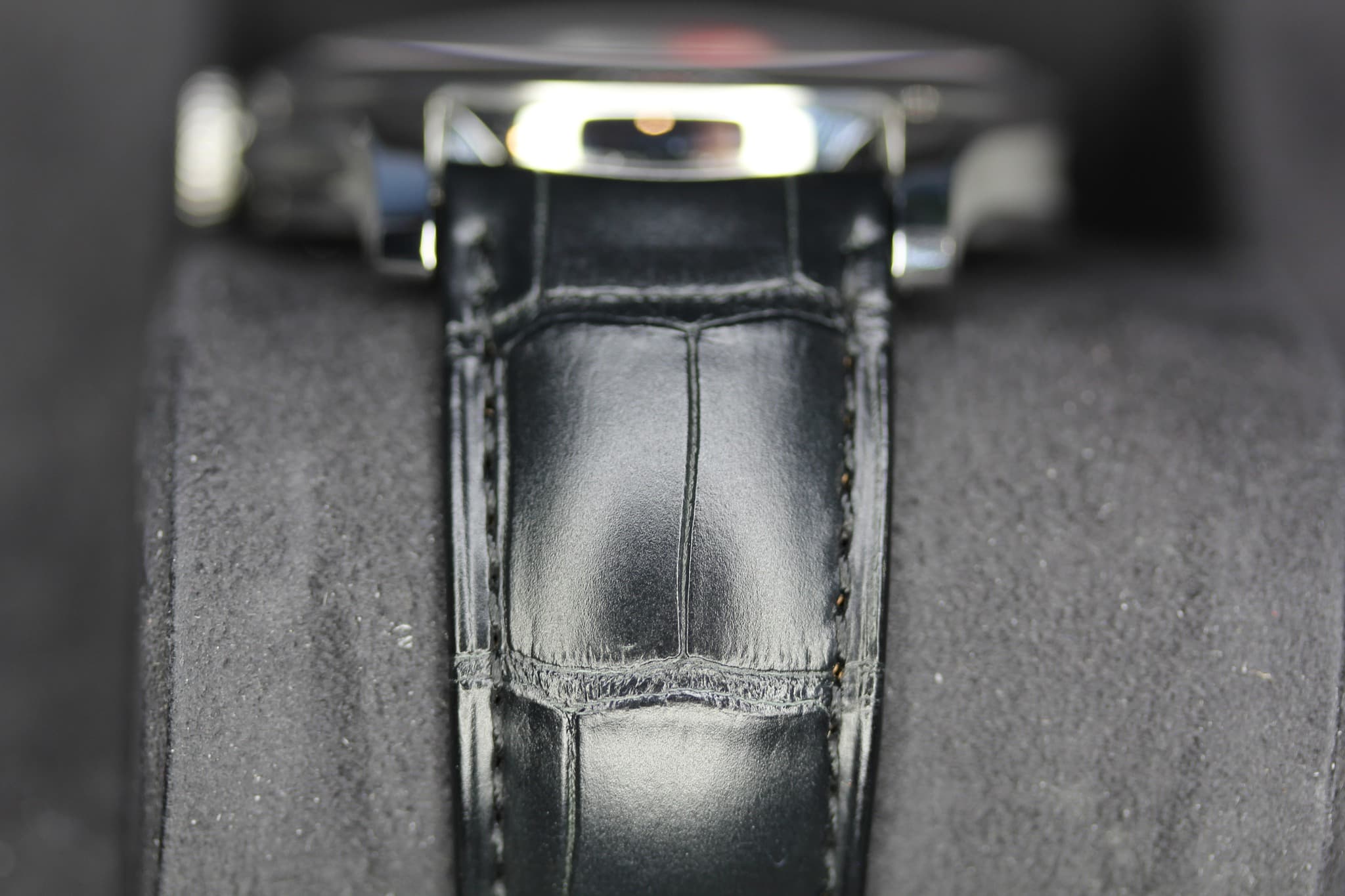 May be an image of wrist watch and leather