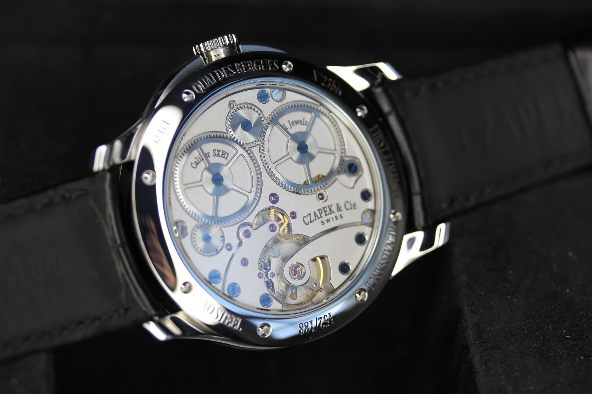 May be an image of wrist watch and text