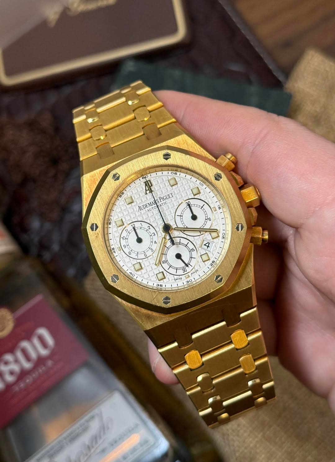 May be an image of wrist watch and text