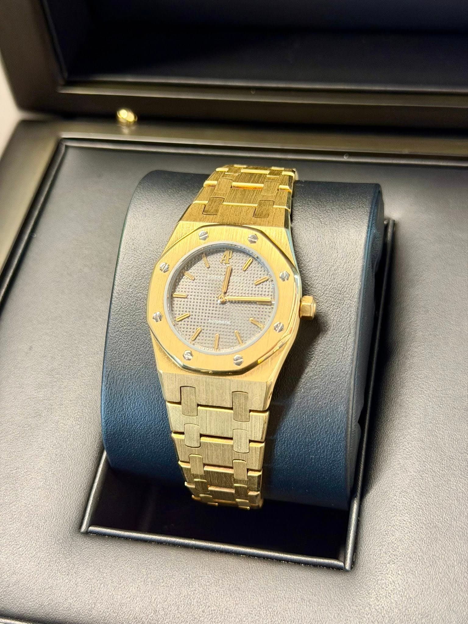 May be an image of wrist watch and text