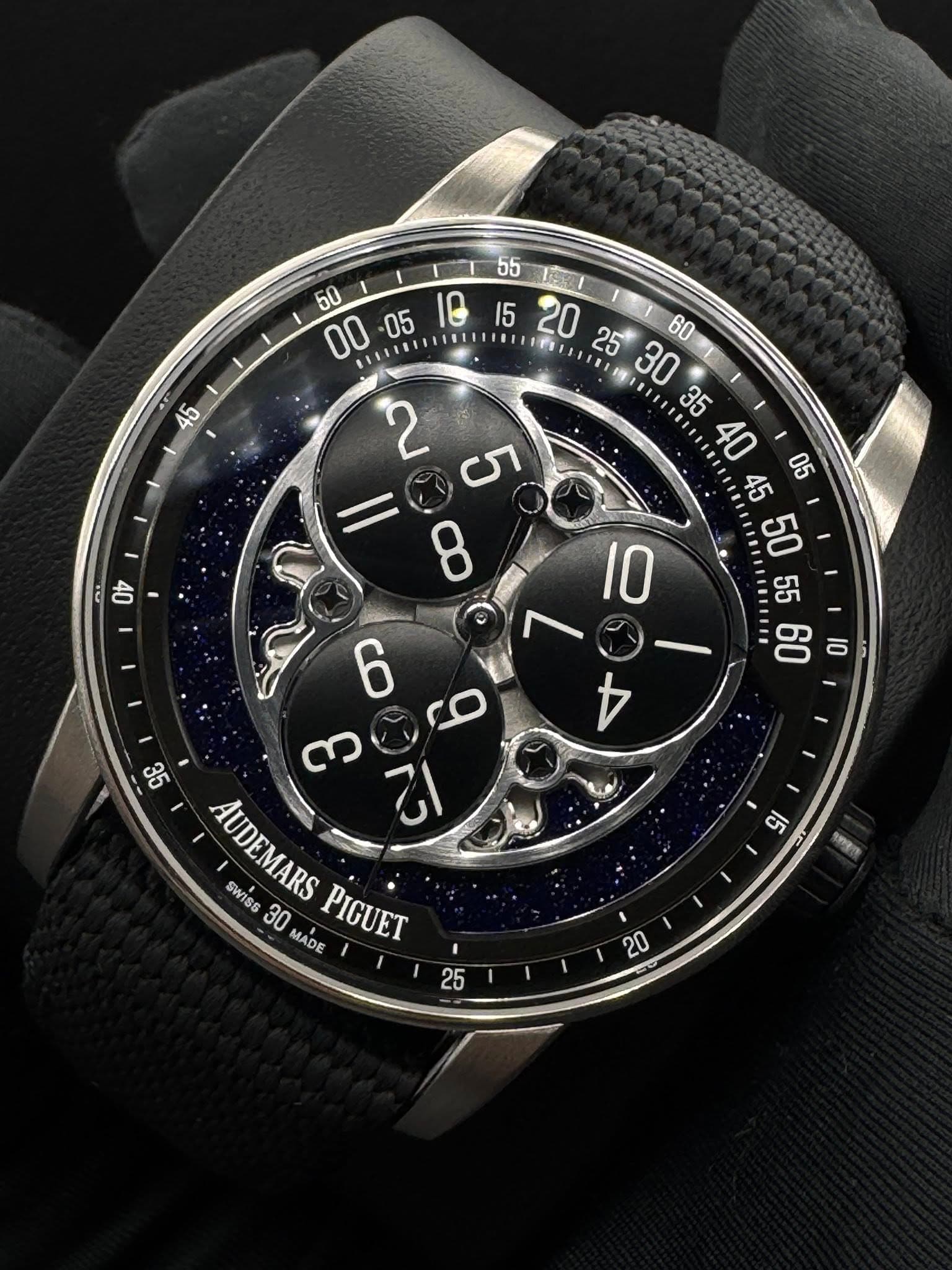May be an image of wrist watch and text that says '45 55 ISE / 10 15 20 TIIHIE 25 30 ህ ឡ 2 ဟ קת و ဏ S SWISS AUDEMARS s 30 MADE PIGUET 5 ' 25 20'