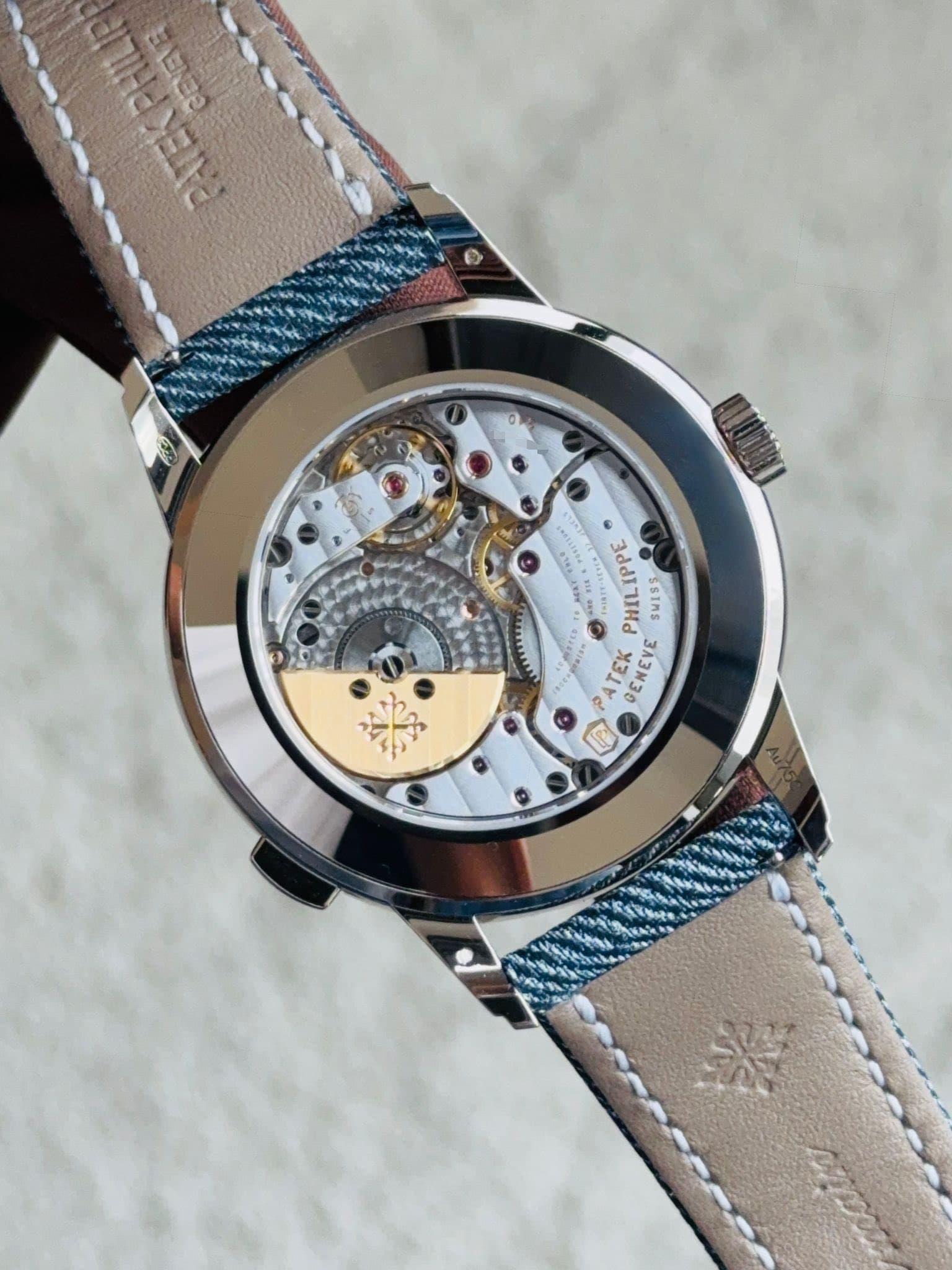 May be an image of wrist watch and text