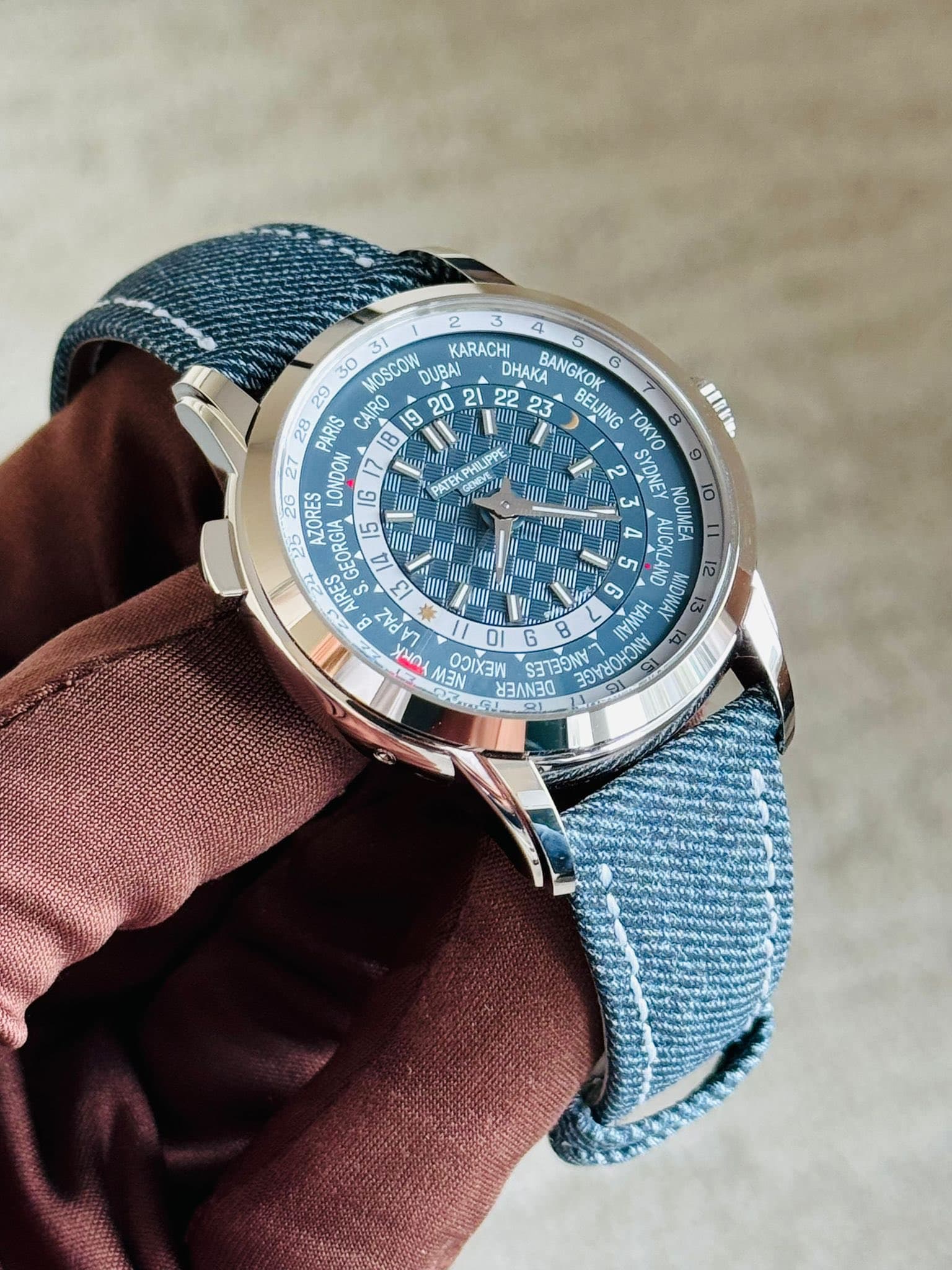 May be an image of wrist watch and text