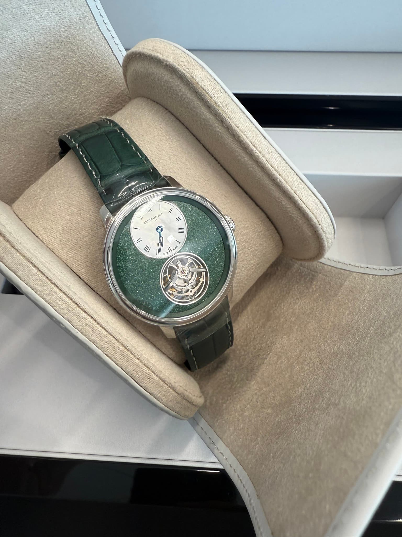 May be an image of wrist watch and text
