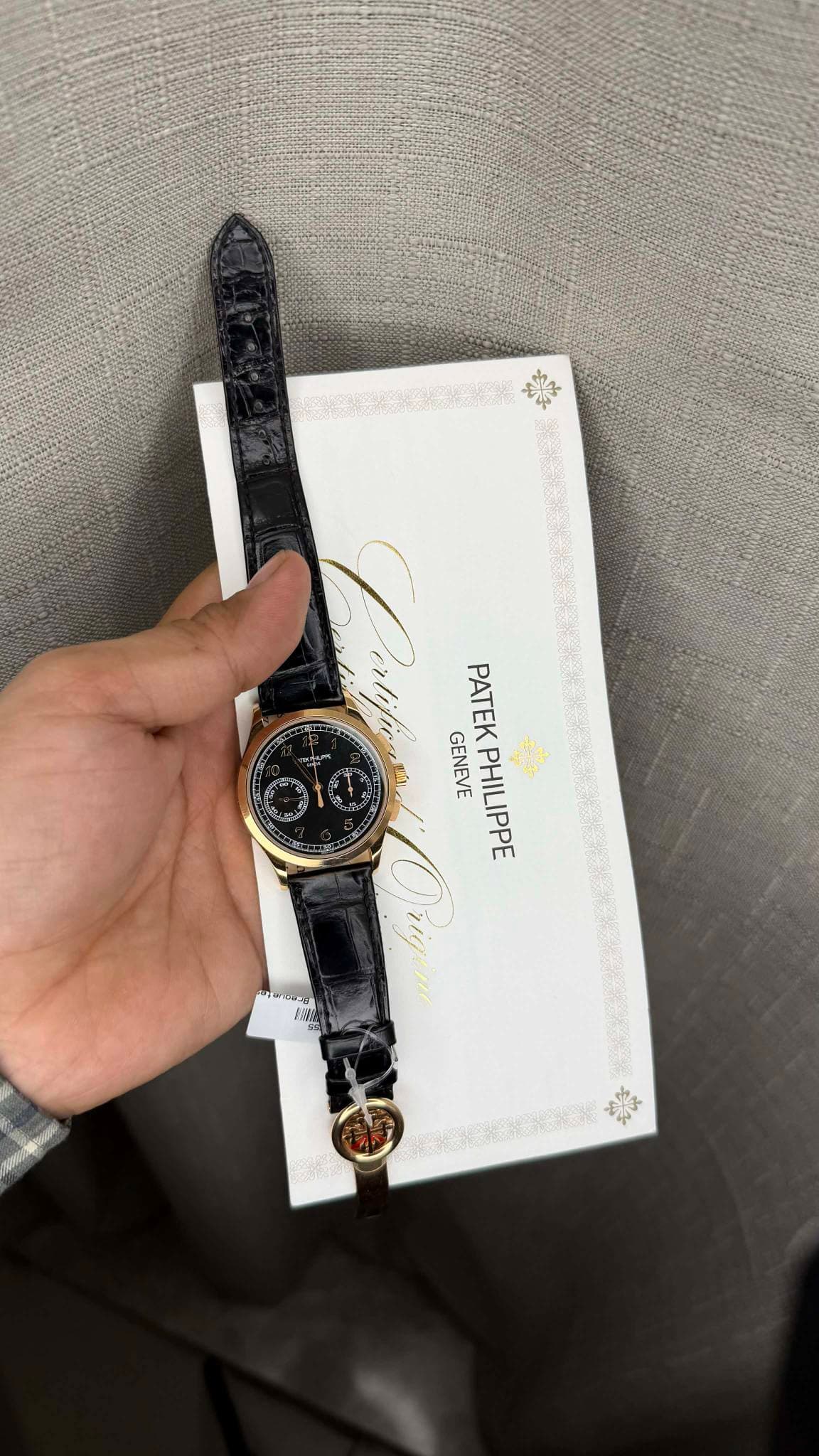 May be an image of wrist watch and text