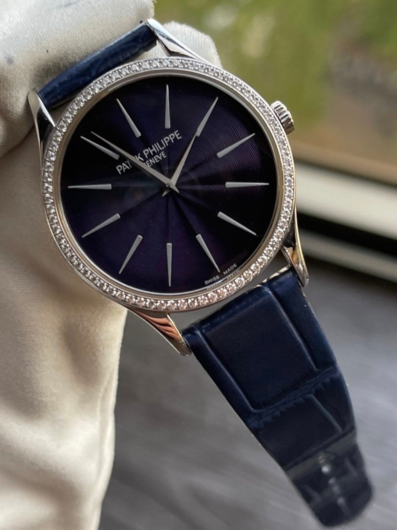 May be an image of wrist watch and text that says 'KPHILIPPE ENEVE'