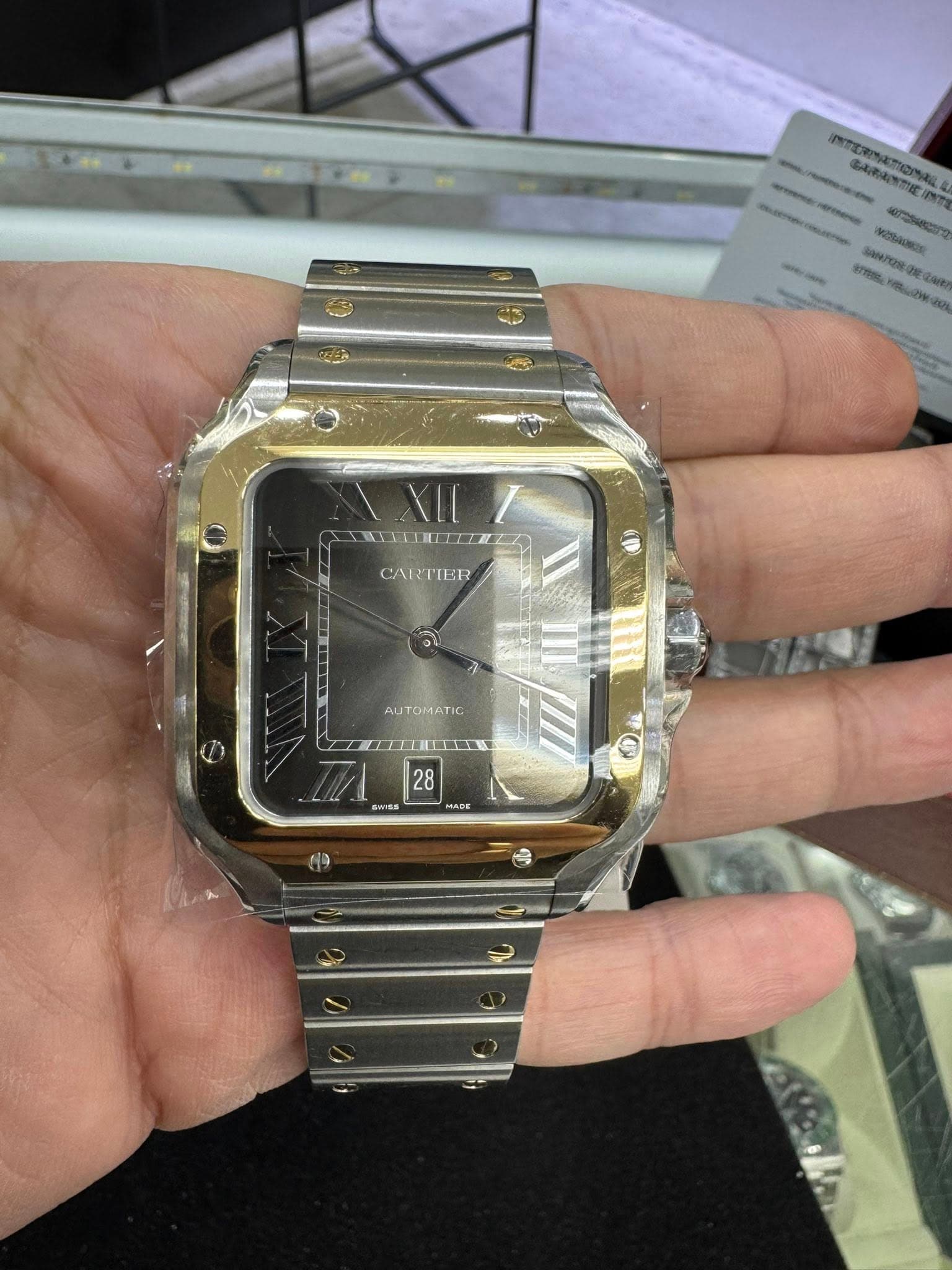 May be an image of digital watch and text