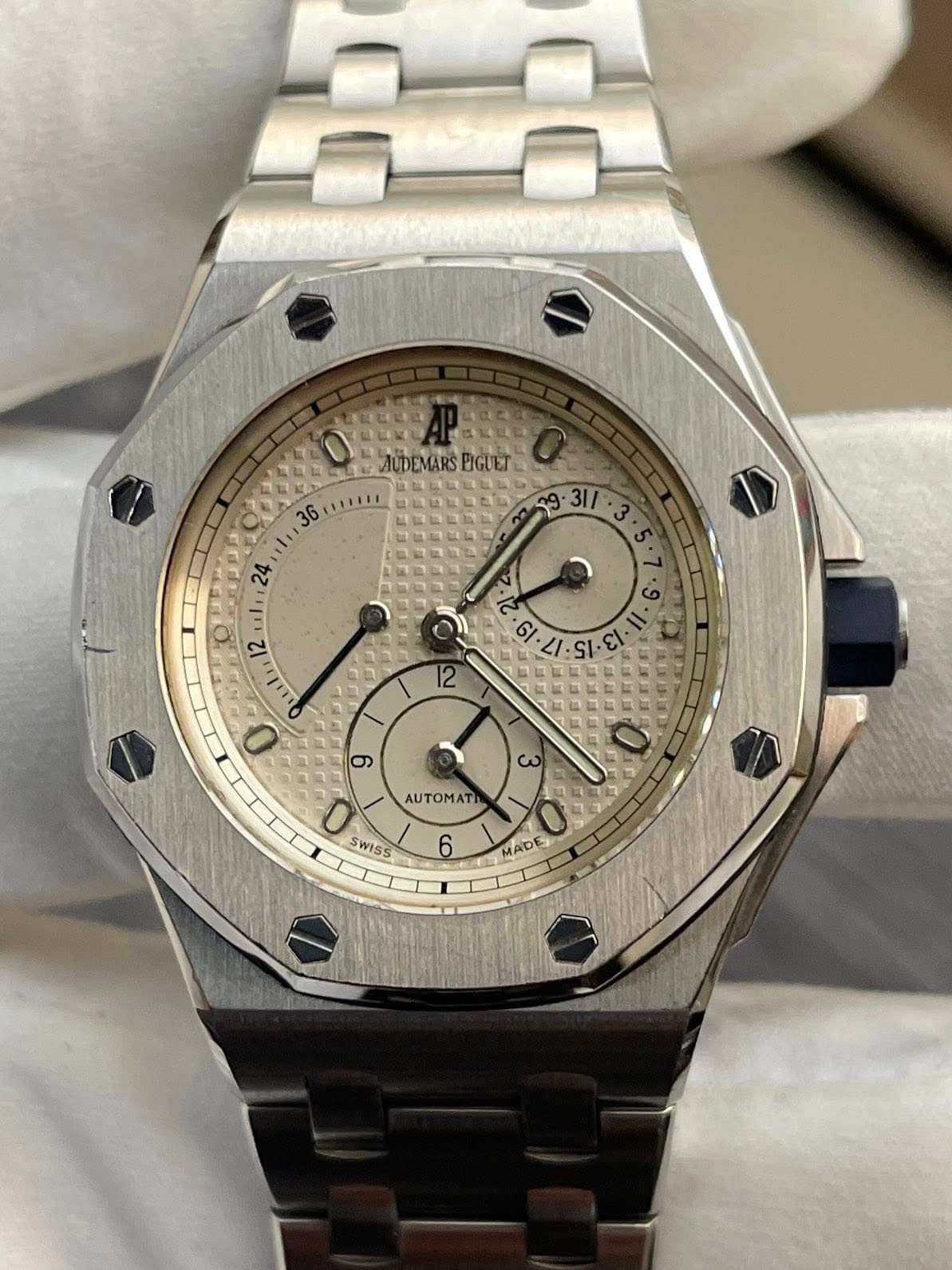 May be an image of wrist watch and text
