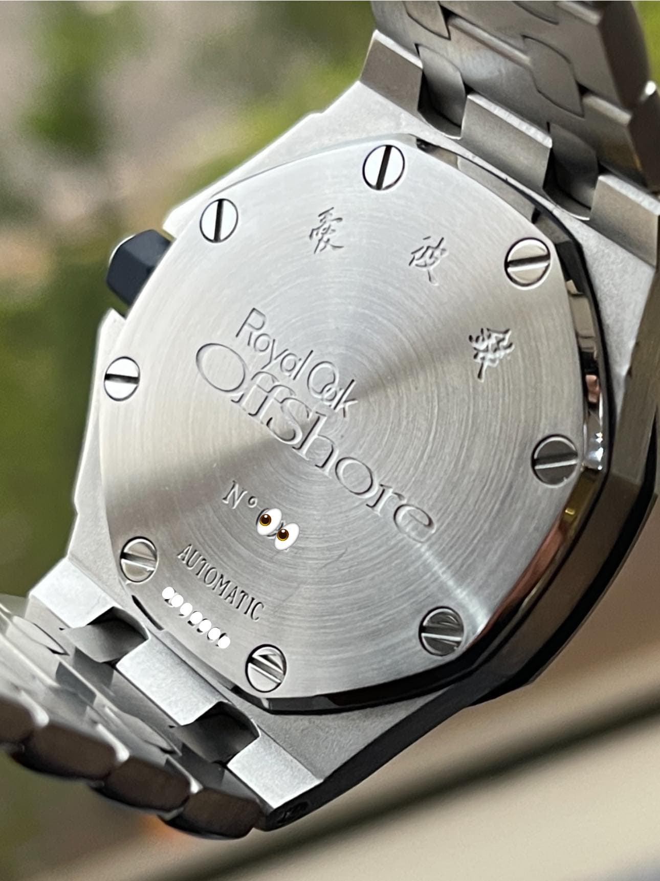 May be an image of wrist watch and text