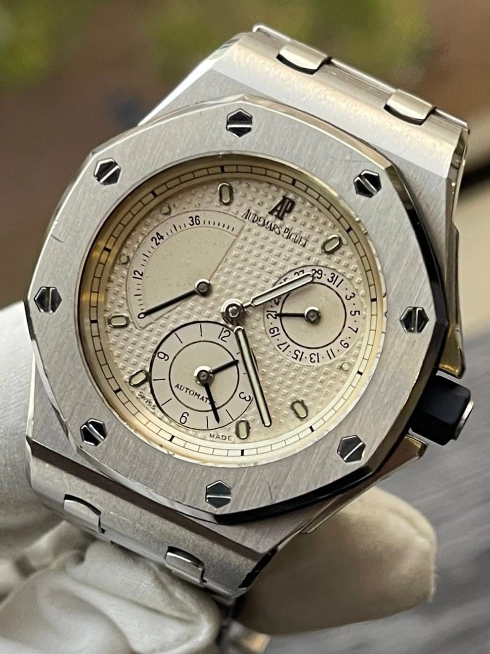 May be an image of wrist watch and text