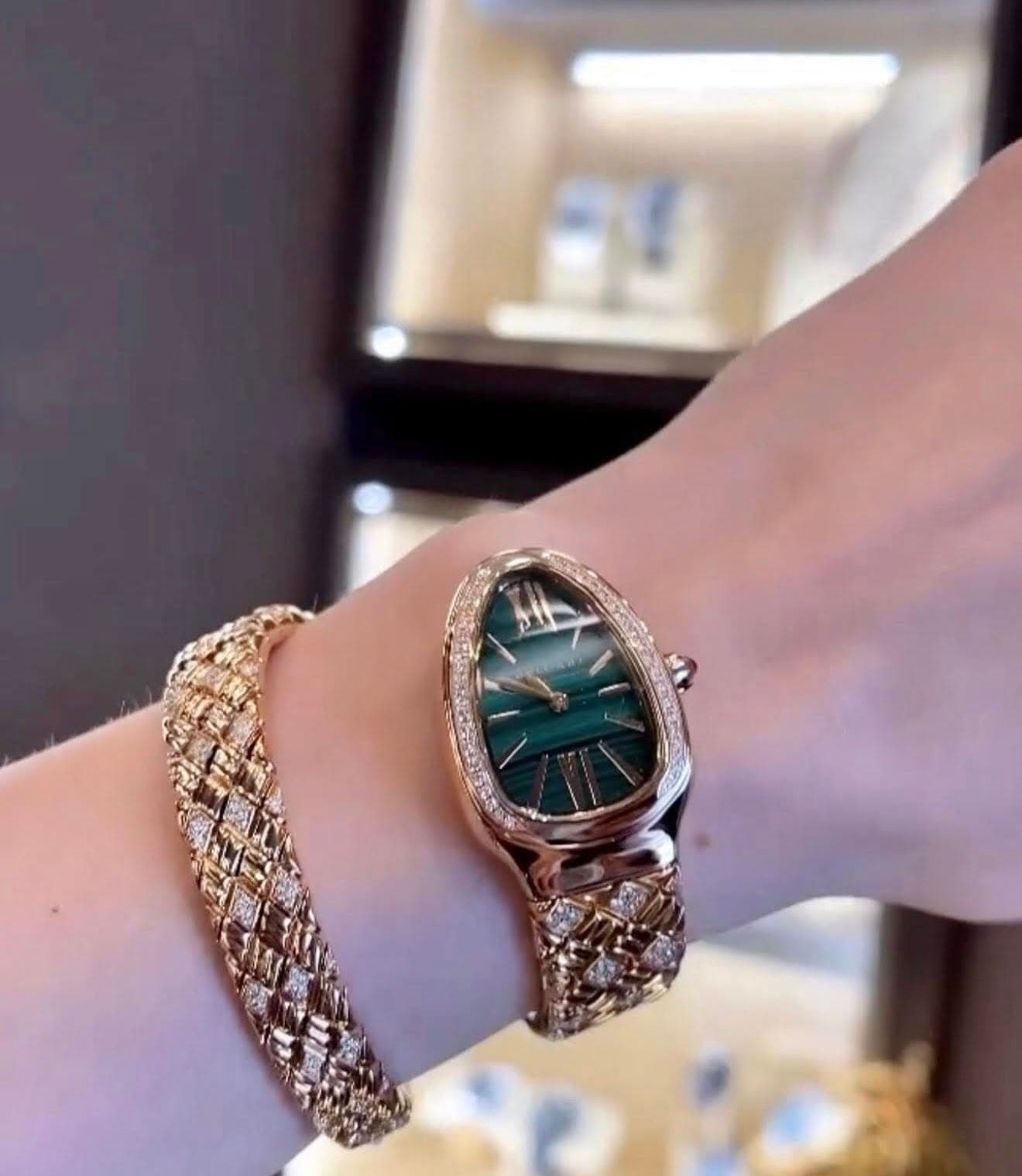 May be an image of jewelry and wrist watch