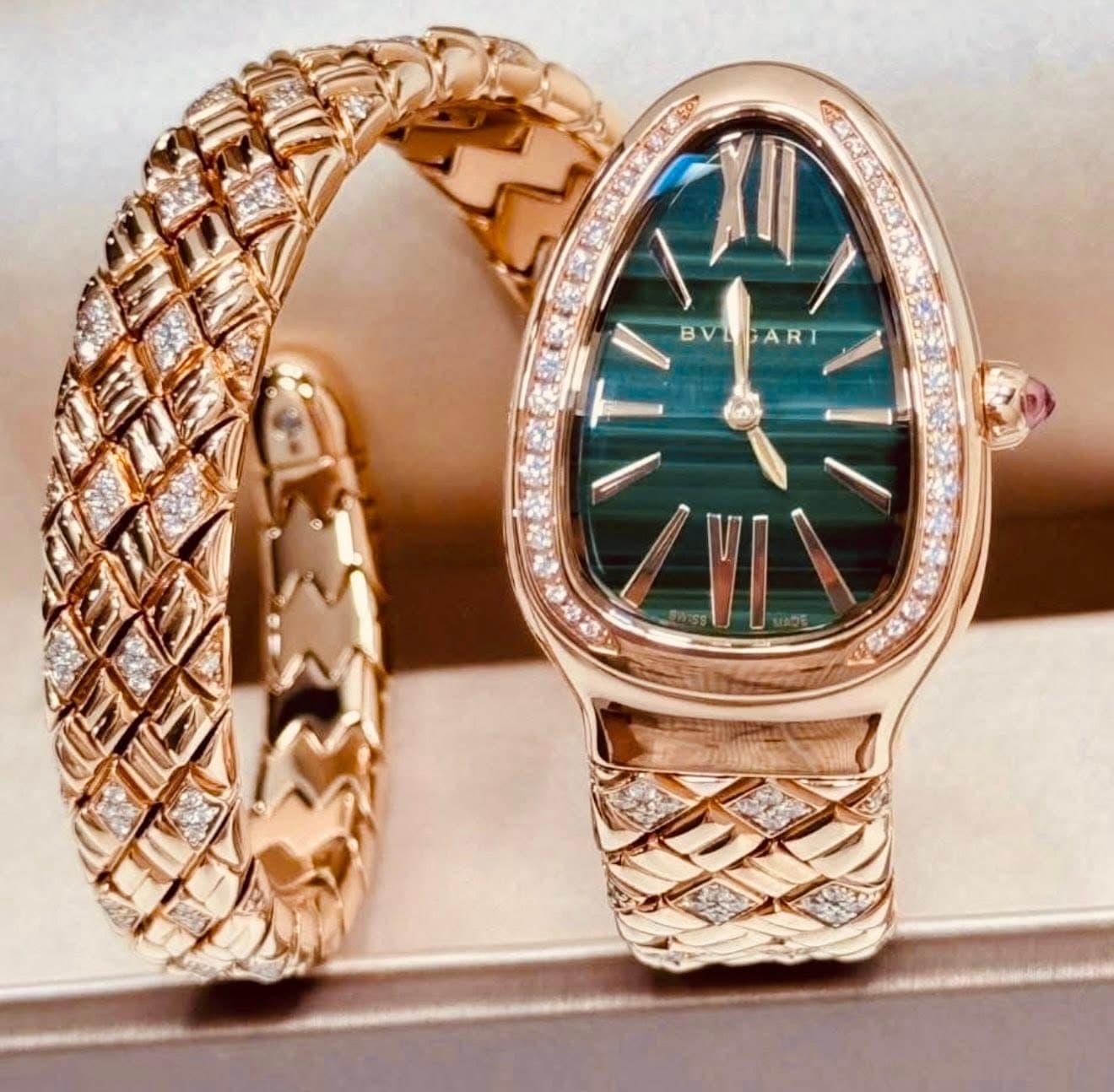 May be an image of wrist watch, jewelry and text