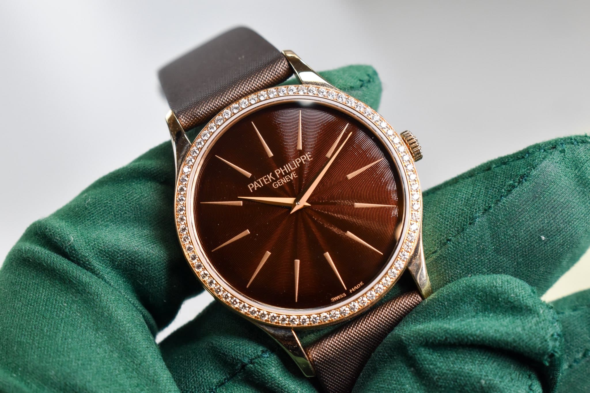 May be an image of wrist watch and text that says 'म PATEKPHILIPPE PHILIPPE IPPE PATEK GENEVE'