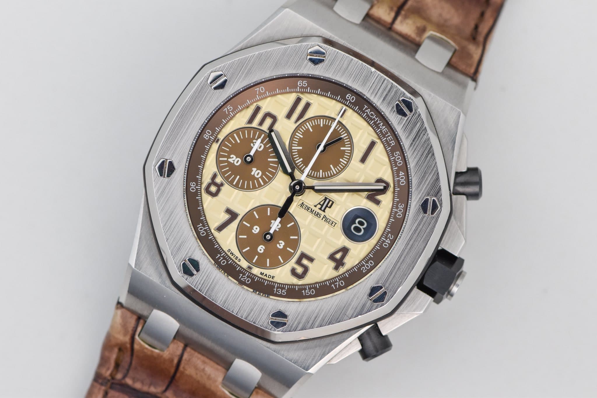 May be an image of wrist watch and text