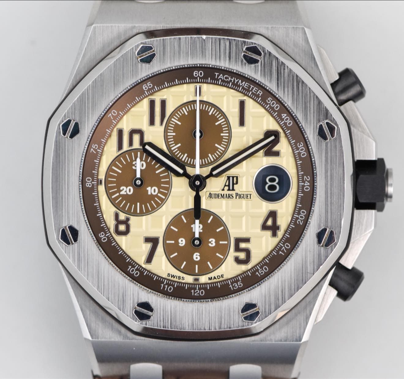 May be an image of wrist watch and text