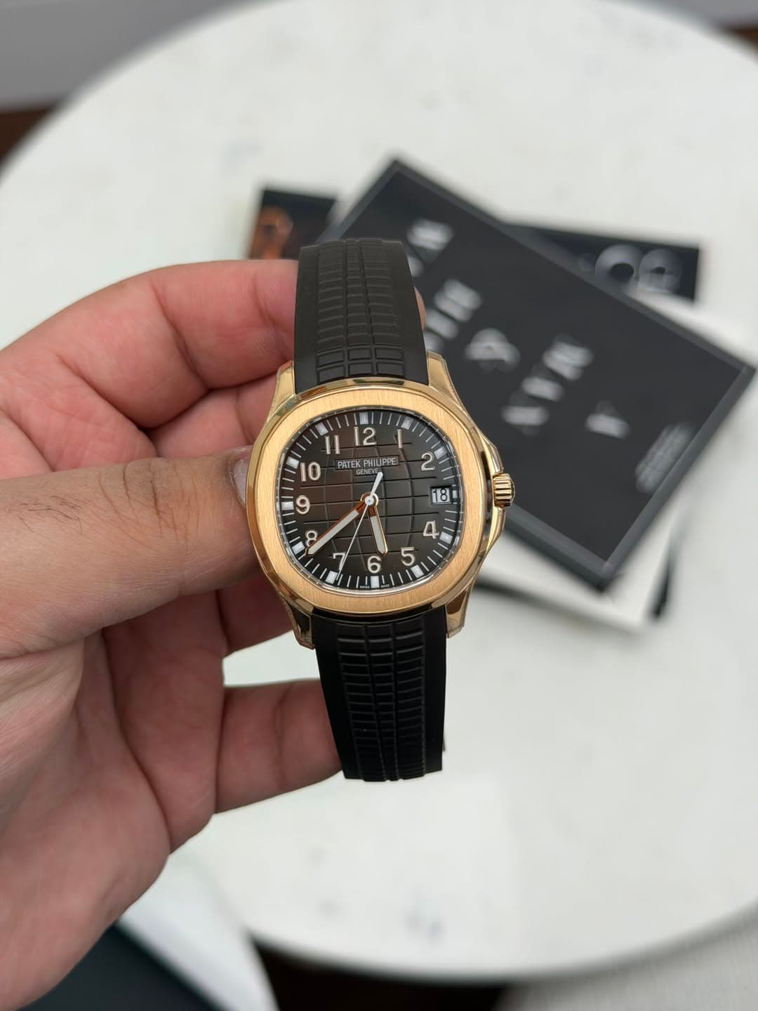 May be an image of wrist watch and text that says '12 1I 0 PATEK PHILIPPE PRTEKPHILIPPE IPPE '