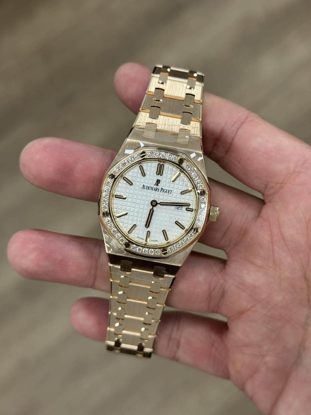 May be an image of wrist watch and text