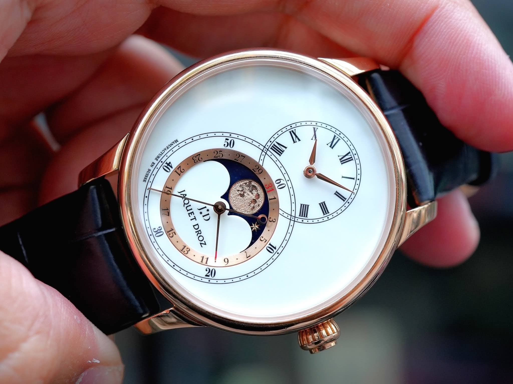May be an image of wrist watch and text