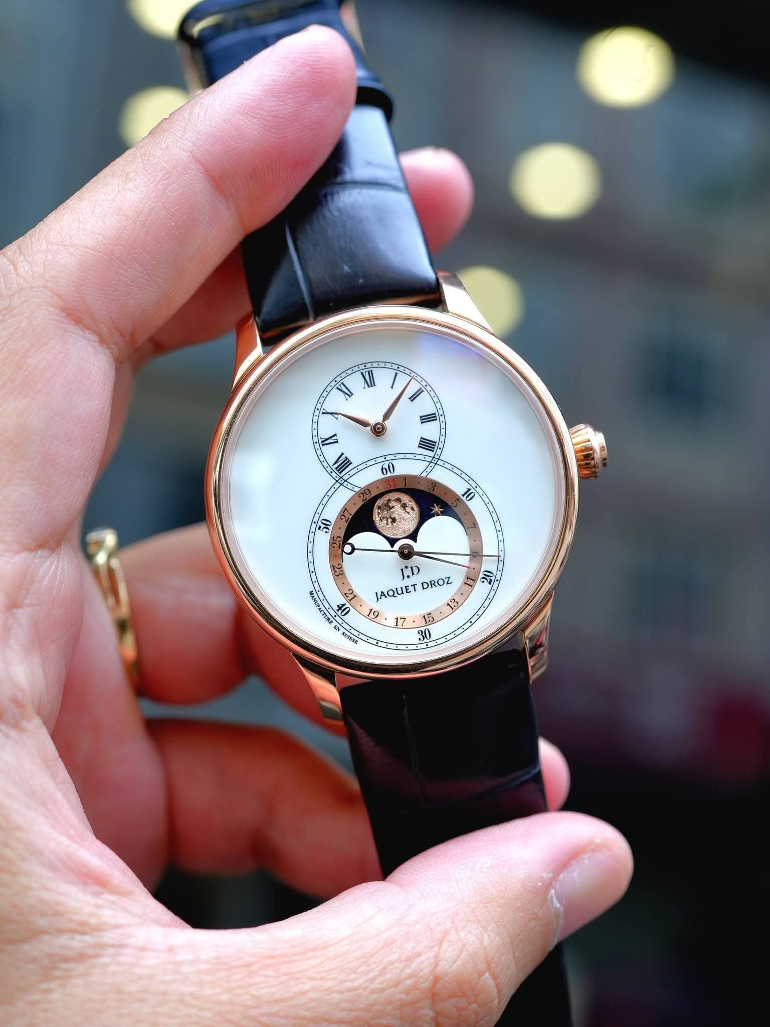 May be an image of digital watch and text that says 'XH 2 I 正 W I G IN JAQUET TD DROZ 13 ا 19 17 5 ي 30'