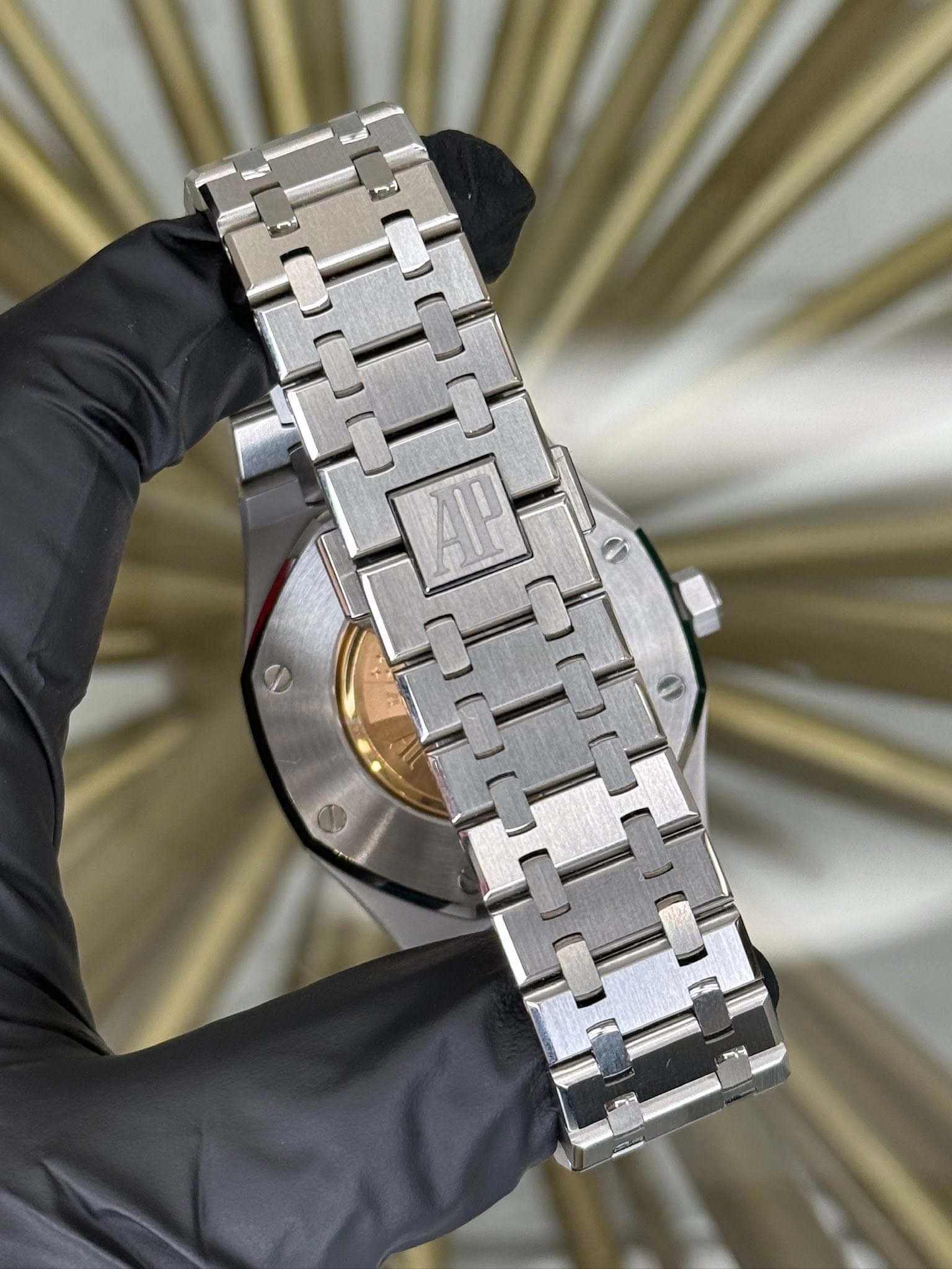 May be an image of wrist watch and text that says 'AIP'
