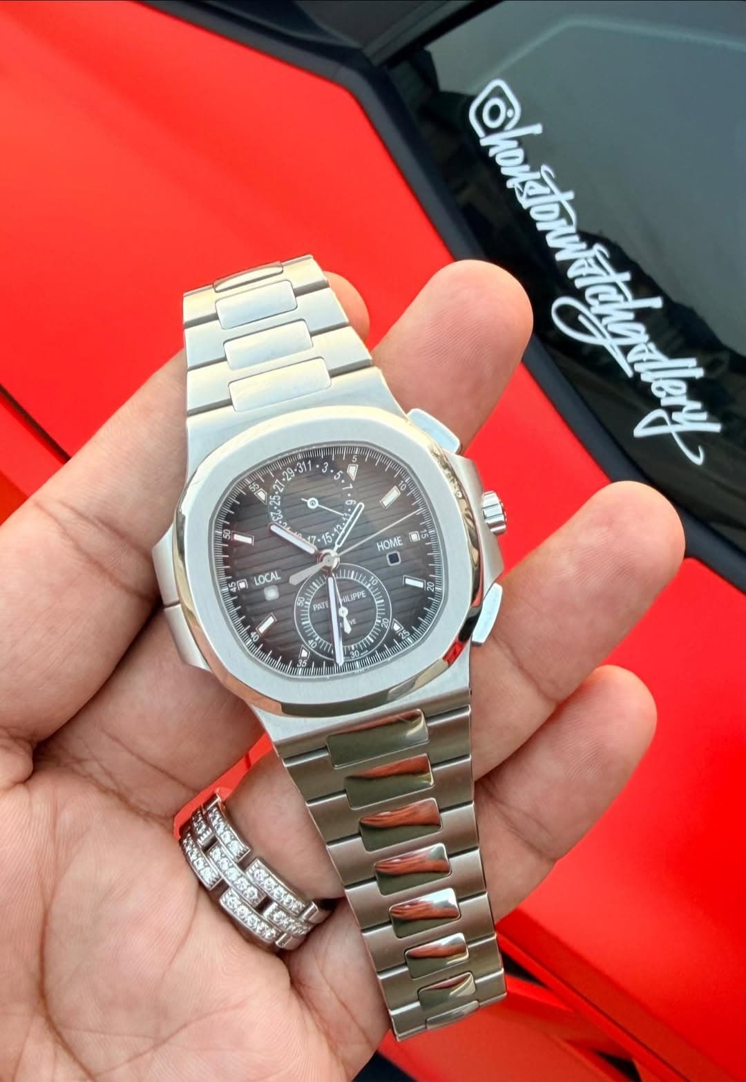 May be an image of wrist watch and text