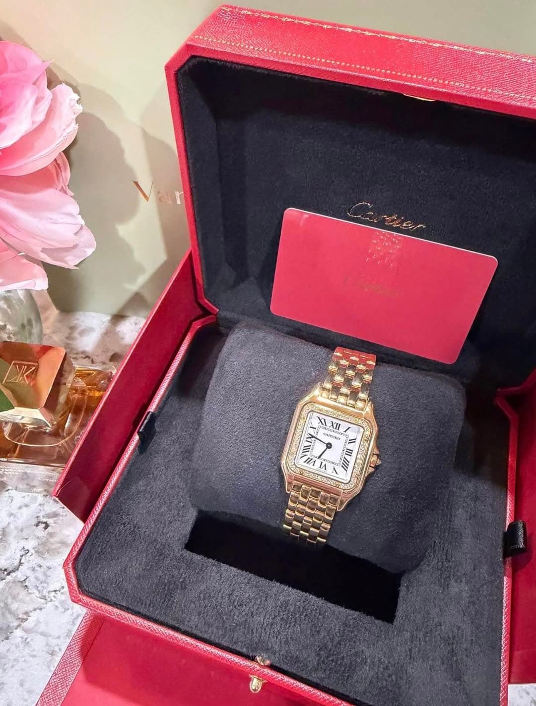 May be an image of wrist watch and text
