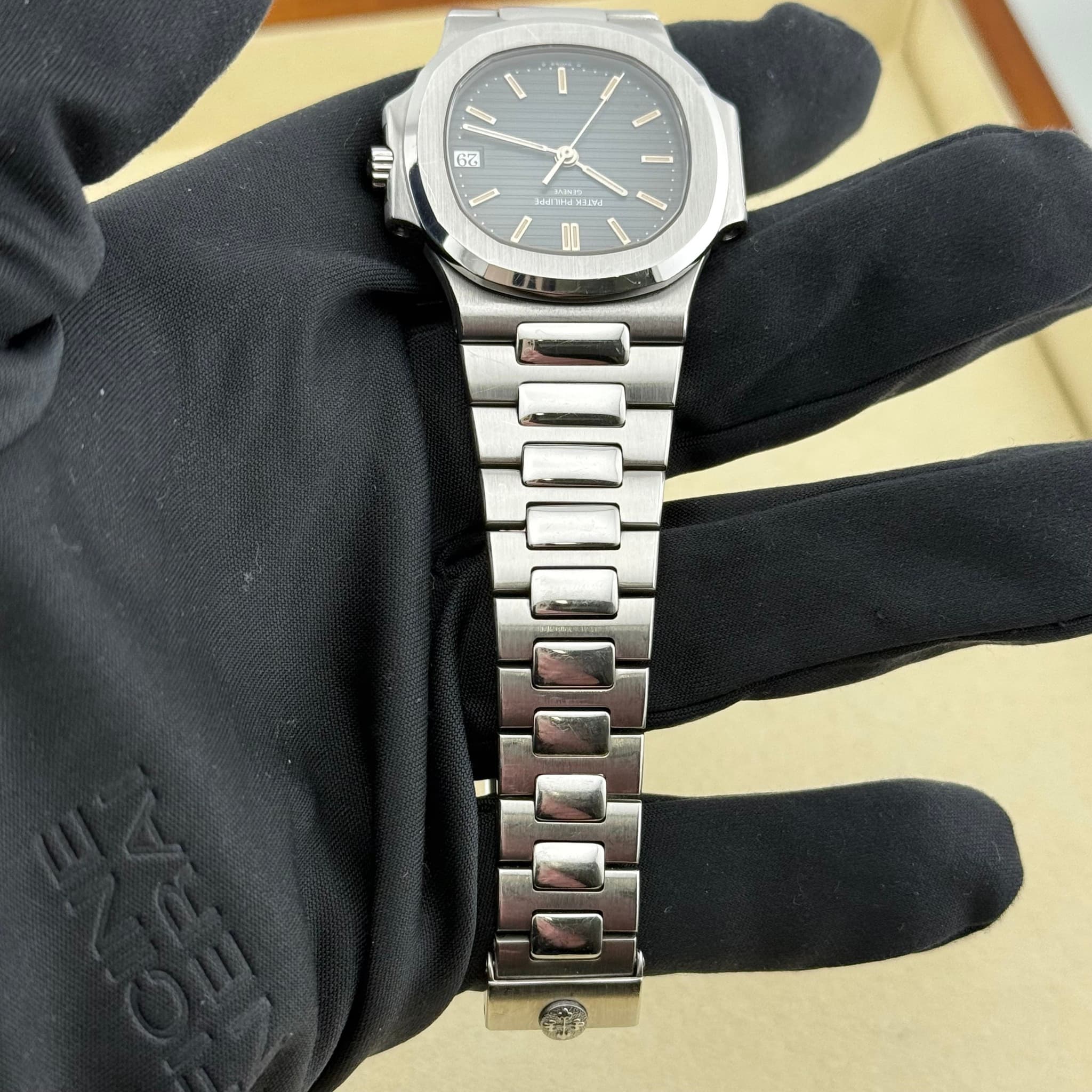 May be an image of wrist watch and text