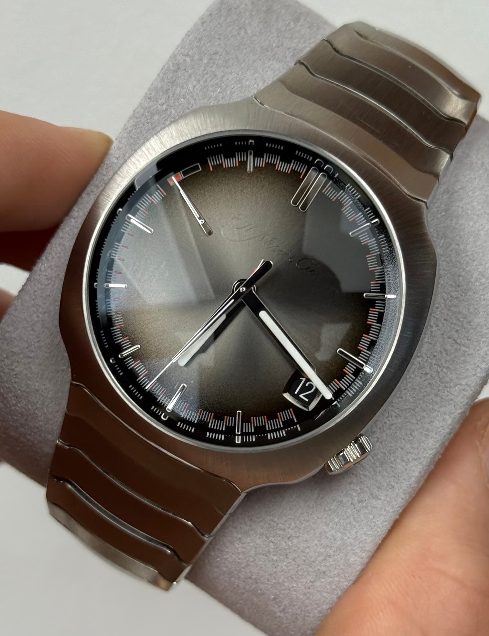 May be an image of digital watch and text