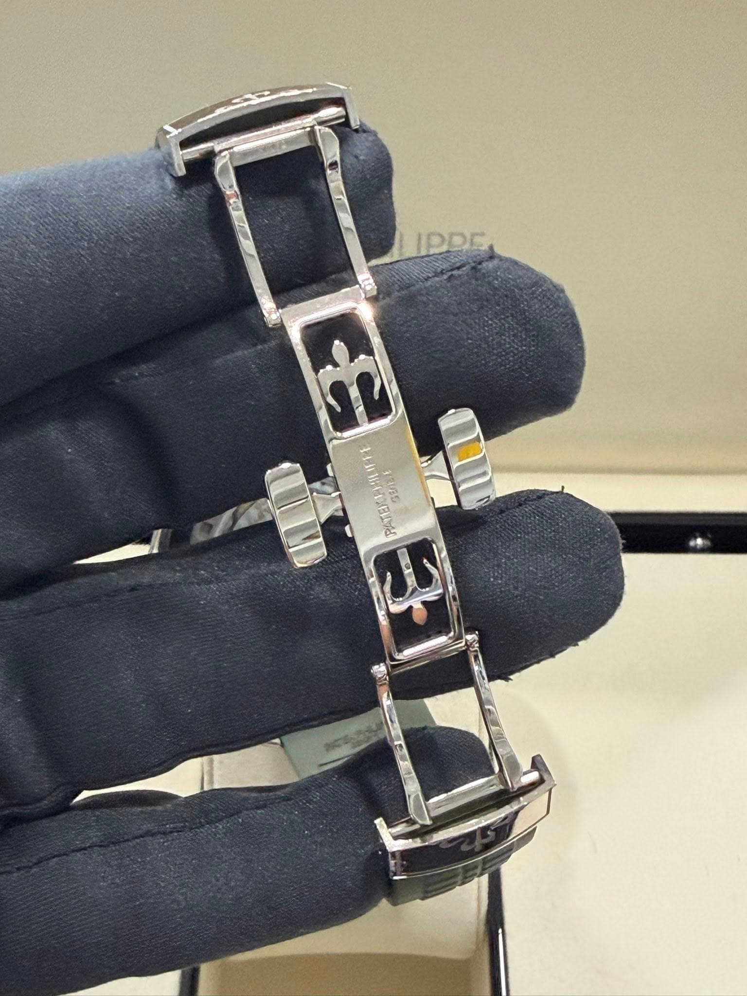 May be an image of jewelry and text