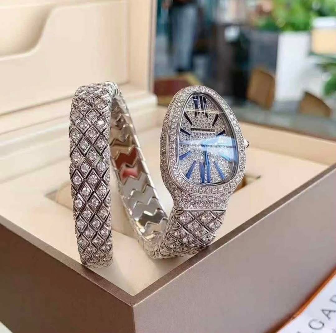 May be an image of ring, wrist watch and text