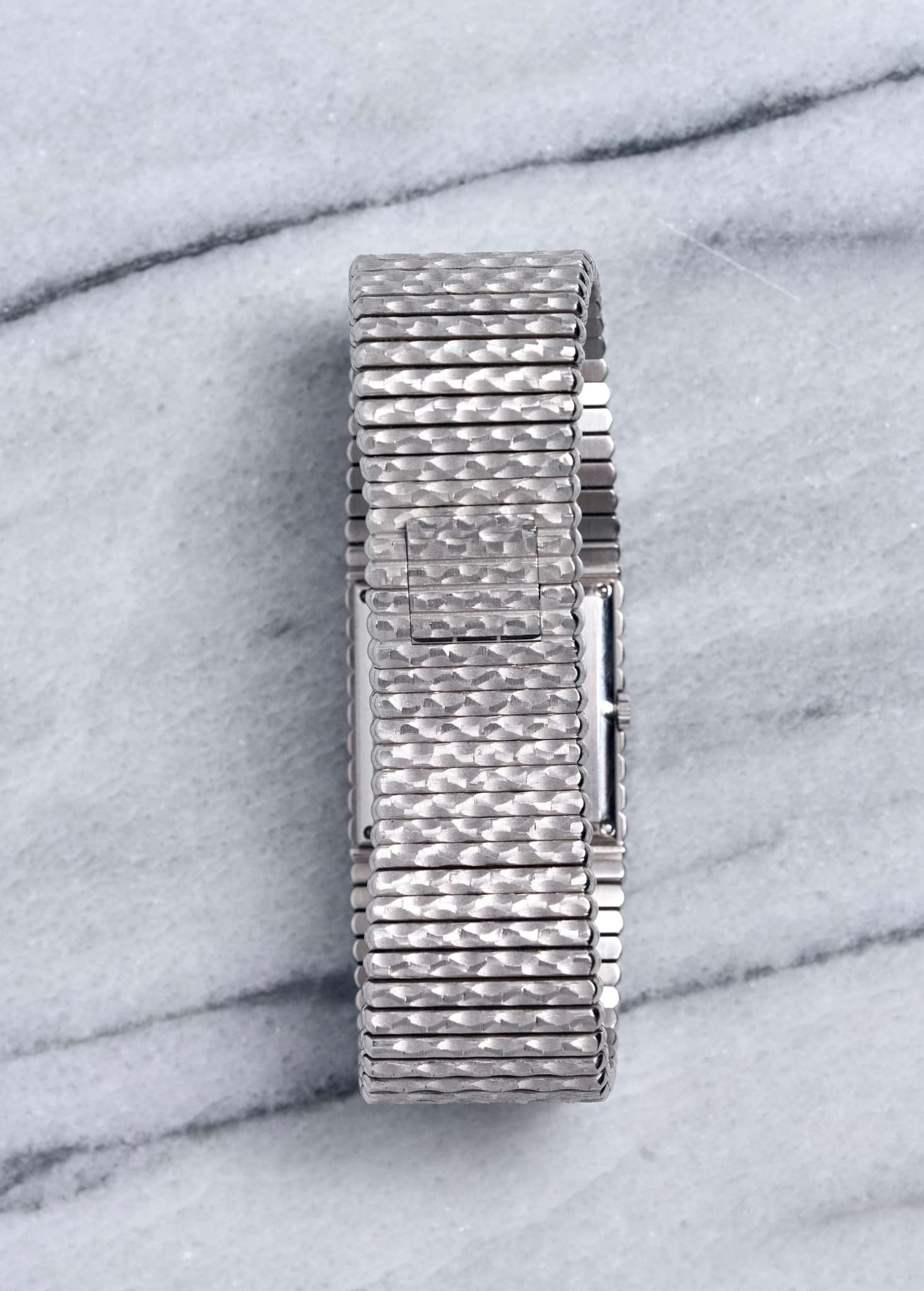 May be an image of wrist watch