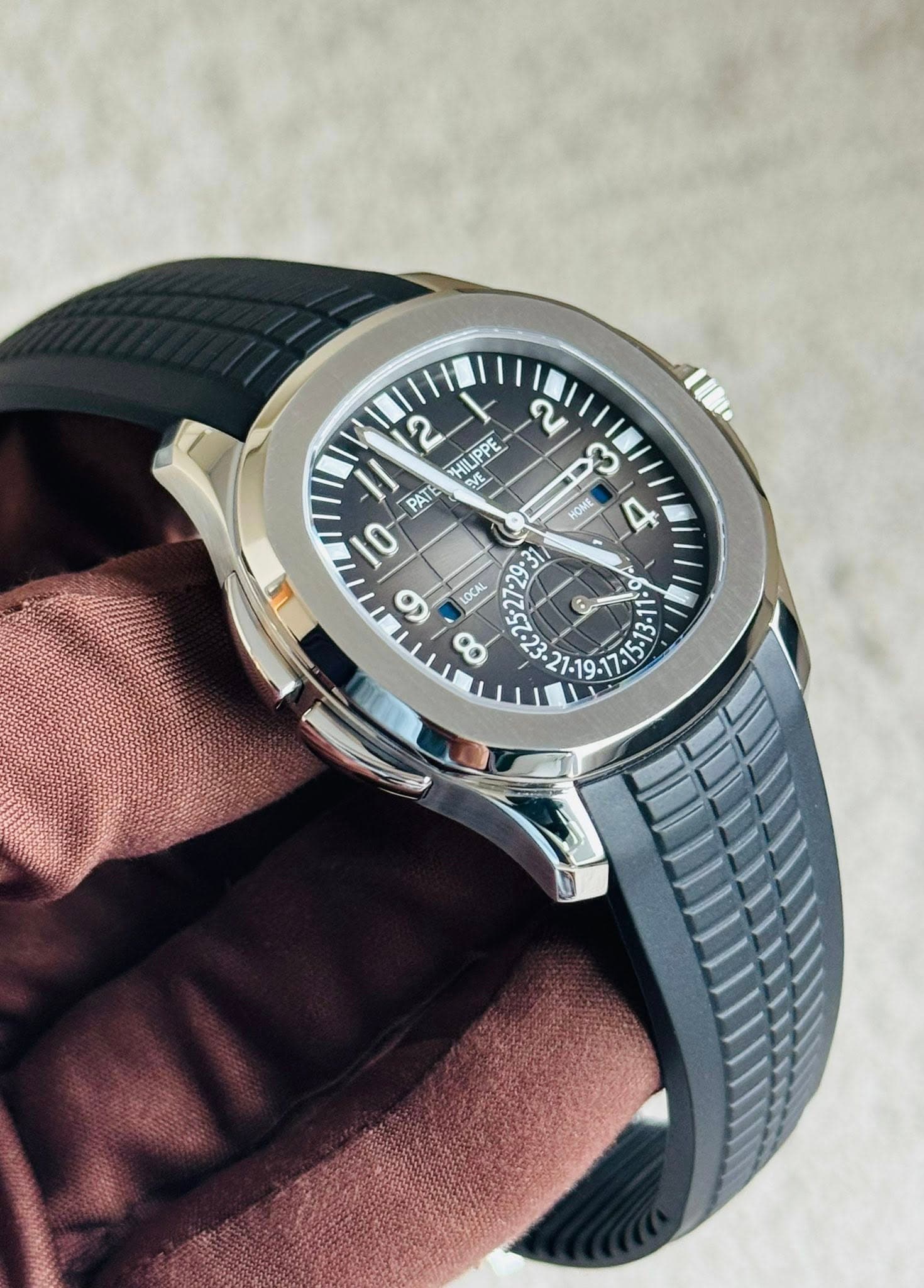 May be an image of wrist watch and text