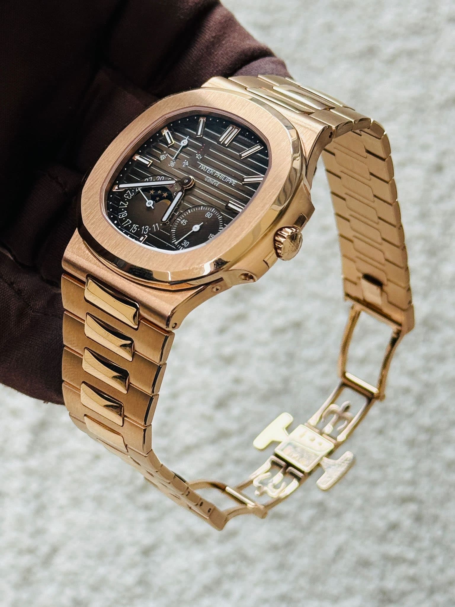 May be an image of wrist watch and text