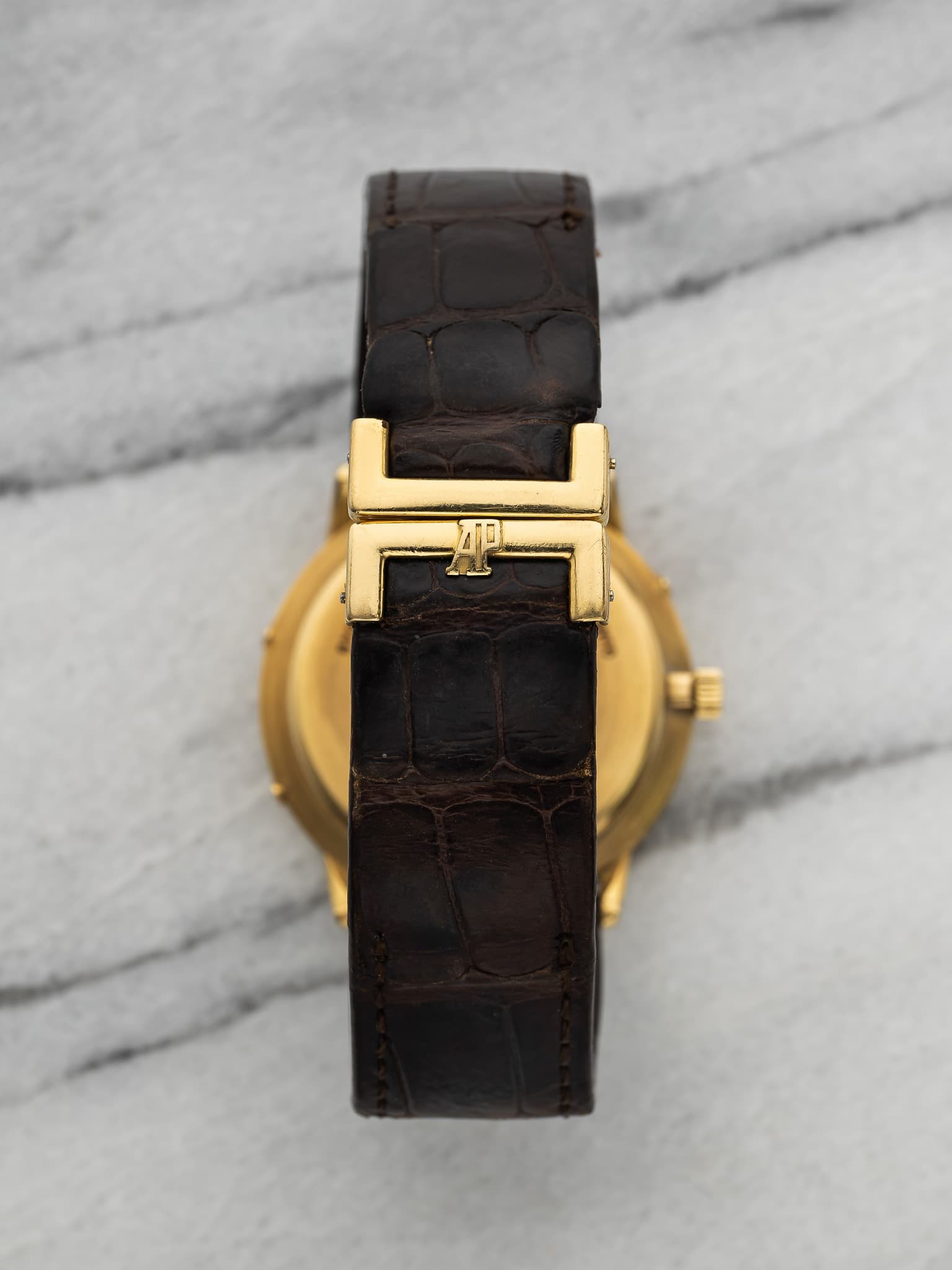 May be an image of wrist watch and leather
