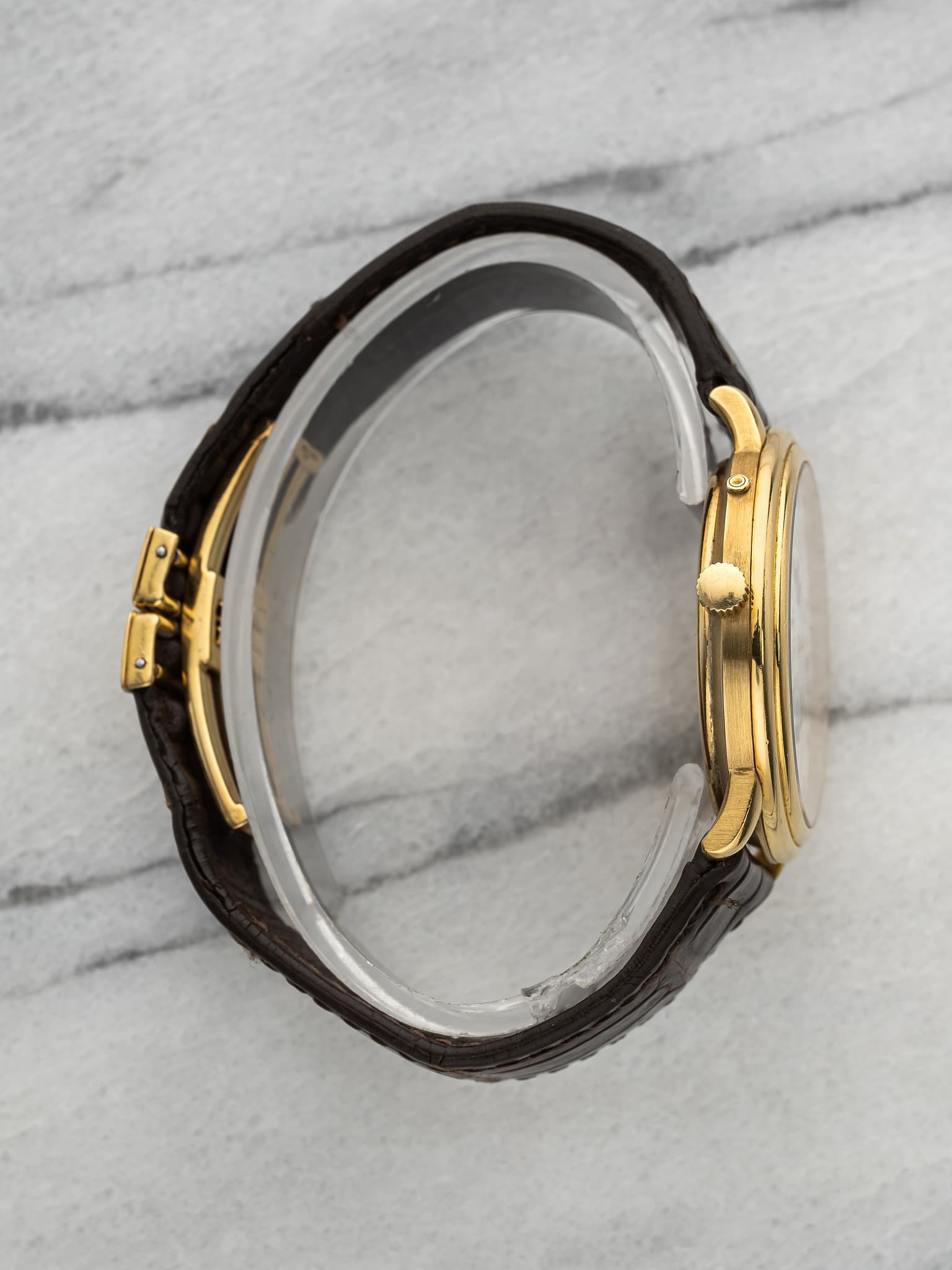 May be an image of wrist watch and jewelry