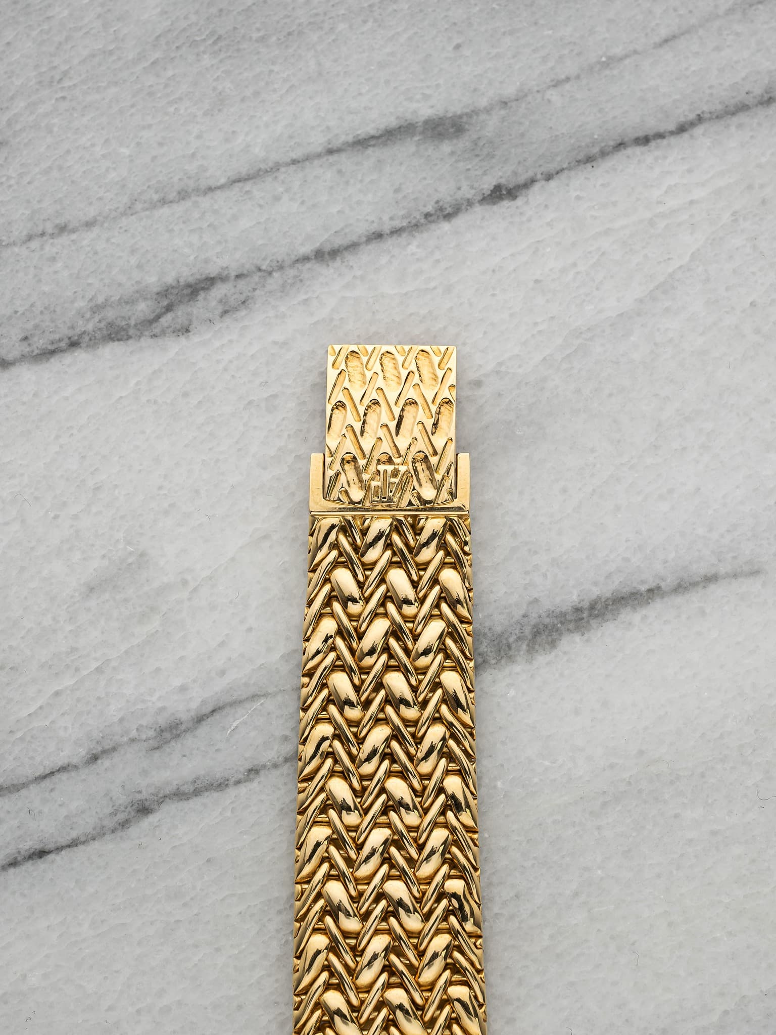 May be an image of jewelry and brass