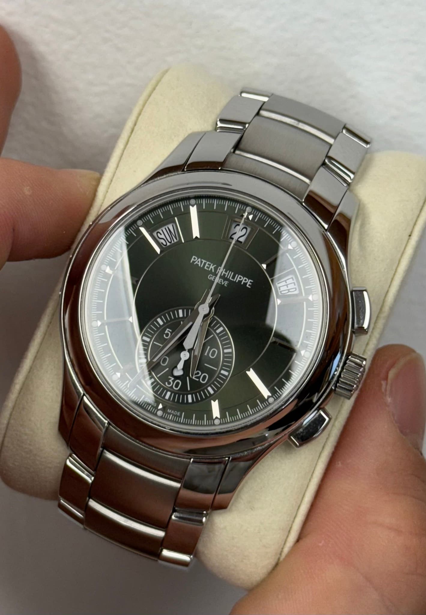 May be an image of wrist watch and text
