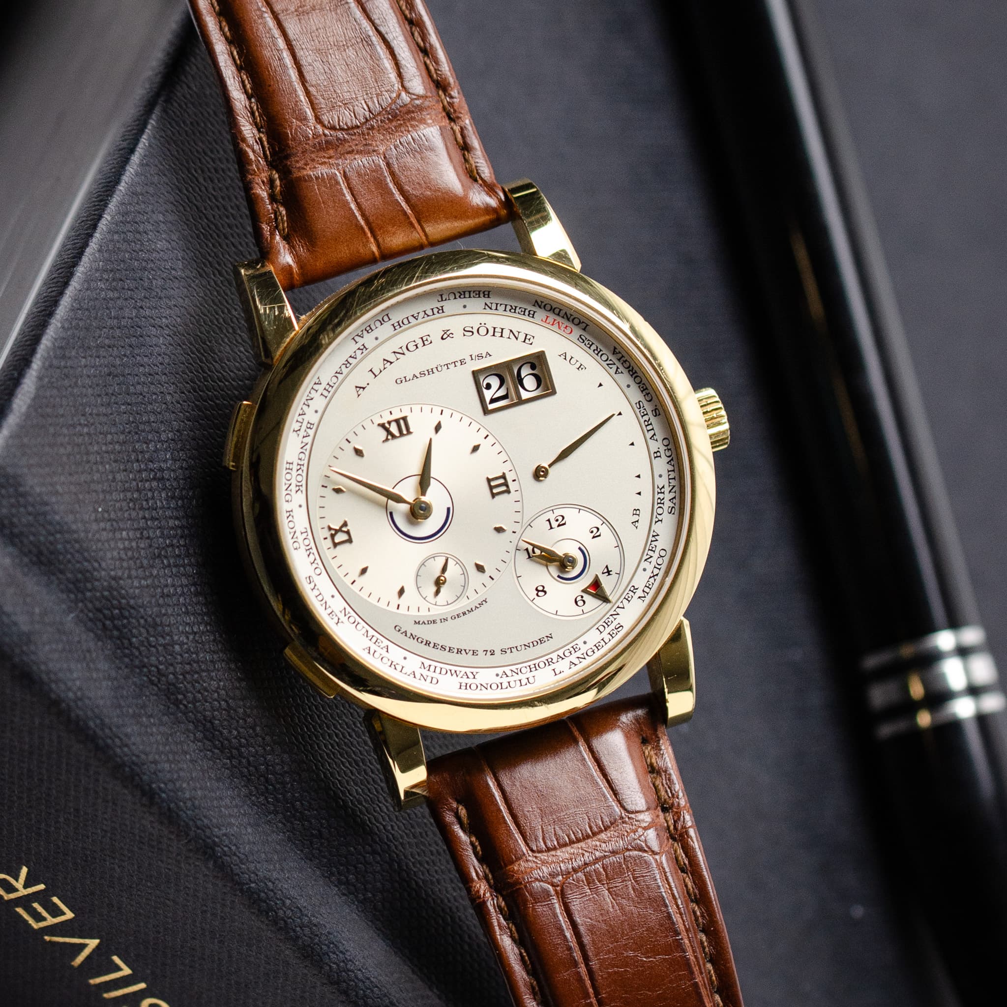 May be an image of wrist watch and text