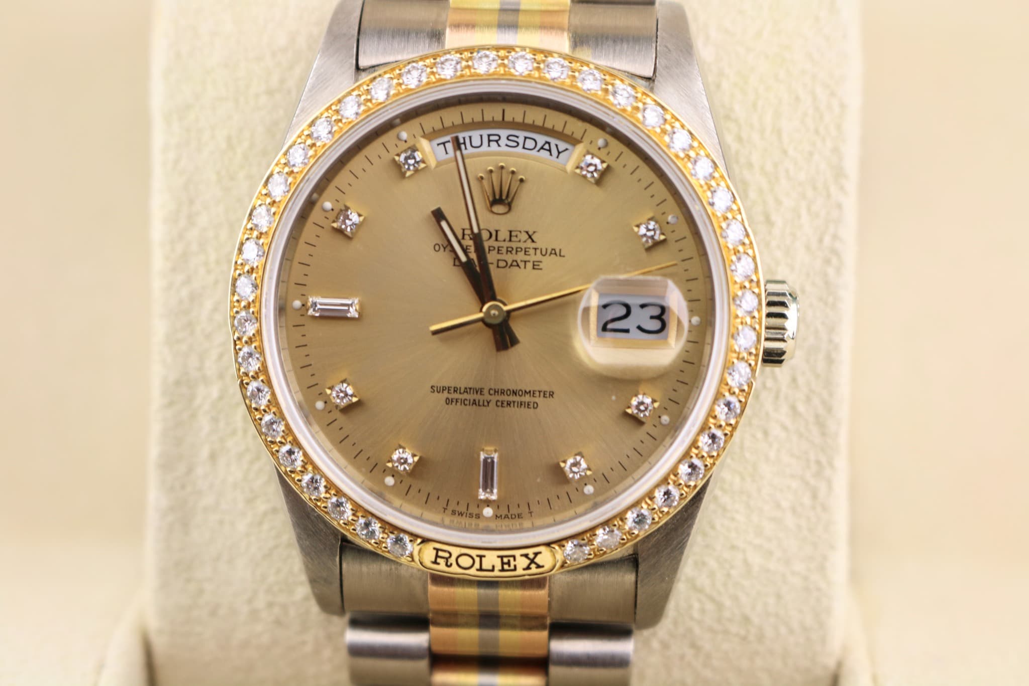 May be an image of wrist watch and text