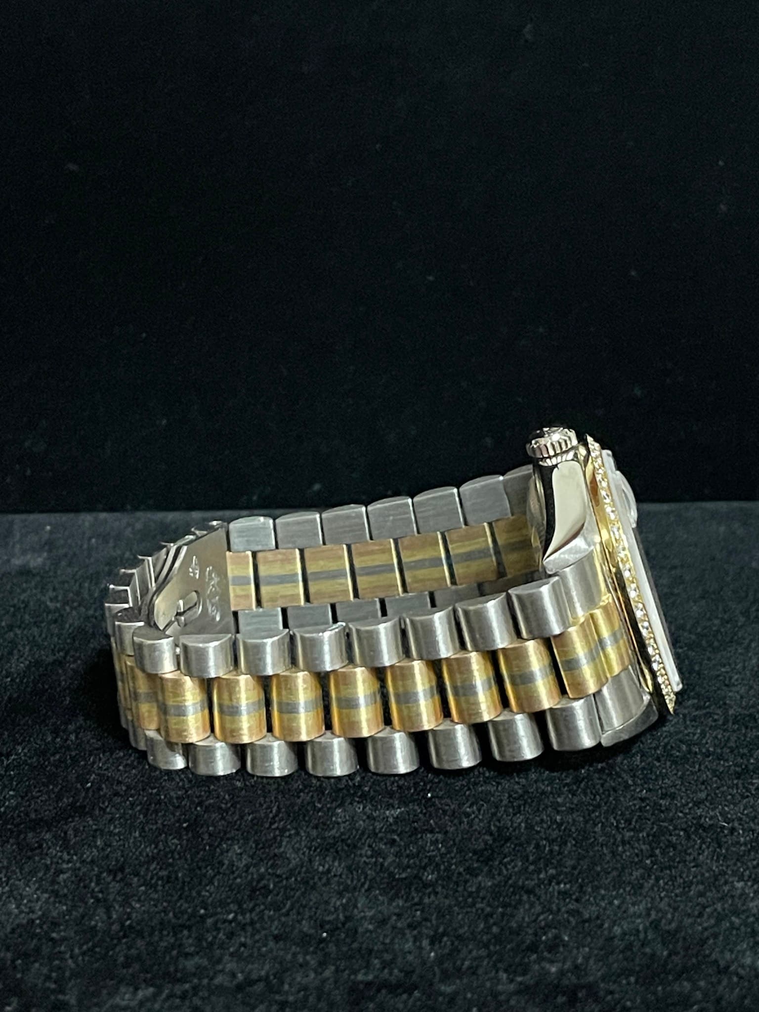 May be an image of wrist watch and jewelry
