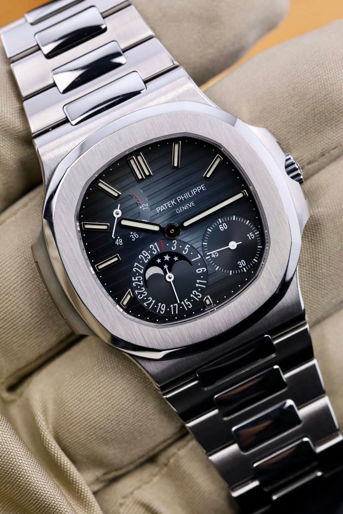 May be an image of wrist watch and text that says 'D ه - - IPPE PHIL 2 PATEK GENEVE L- s a'