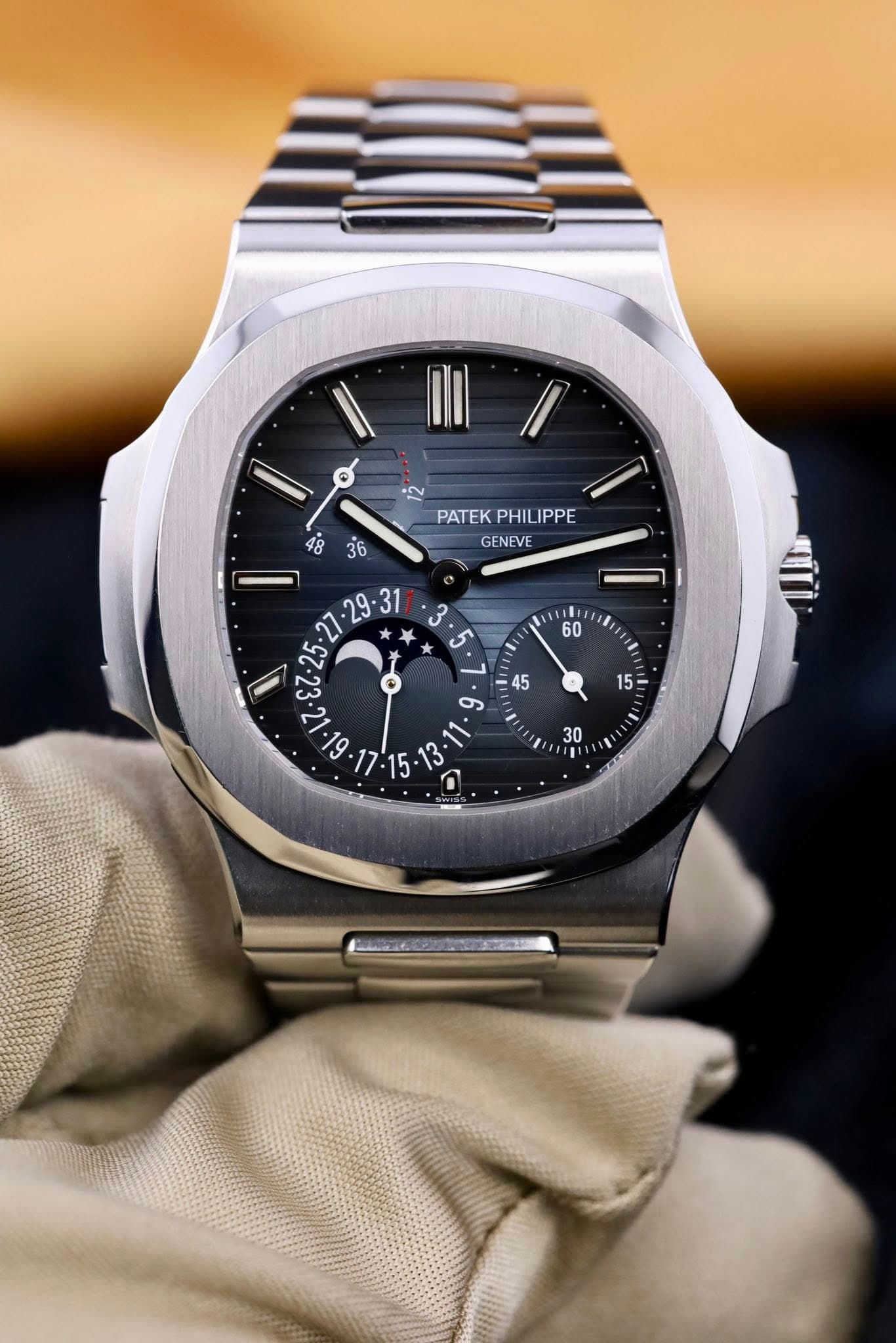 May be an image of wrist watch and text that says 'PATEK PATEKPHILIPPE PHIL IPPE 48 36 GENEVE เย้า . ی ၂ os E E'