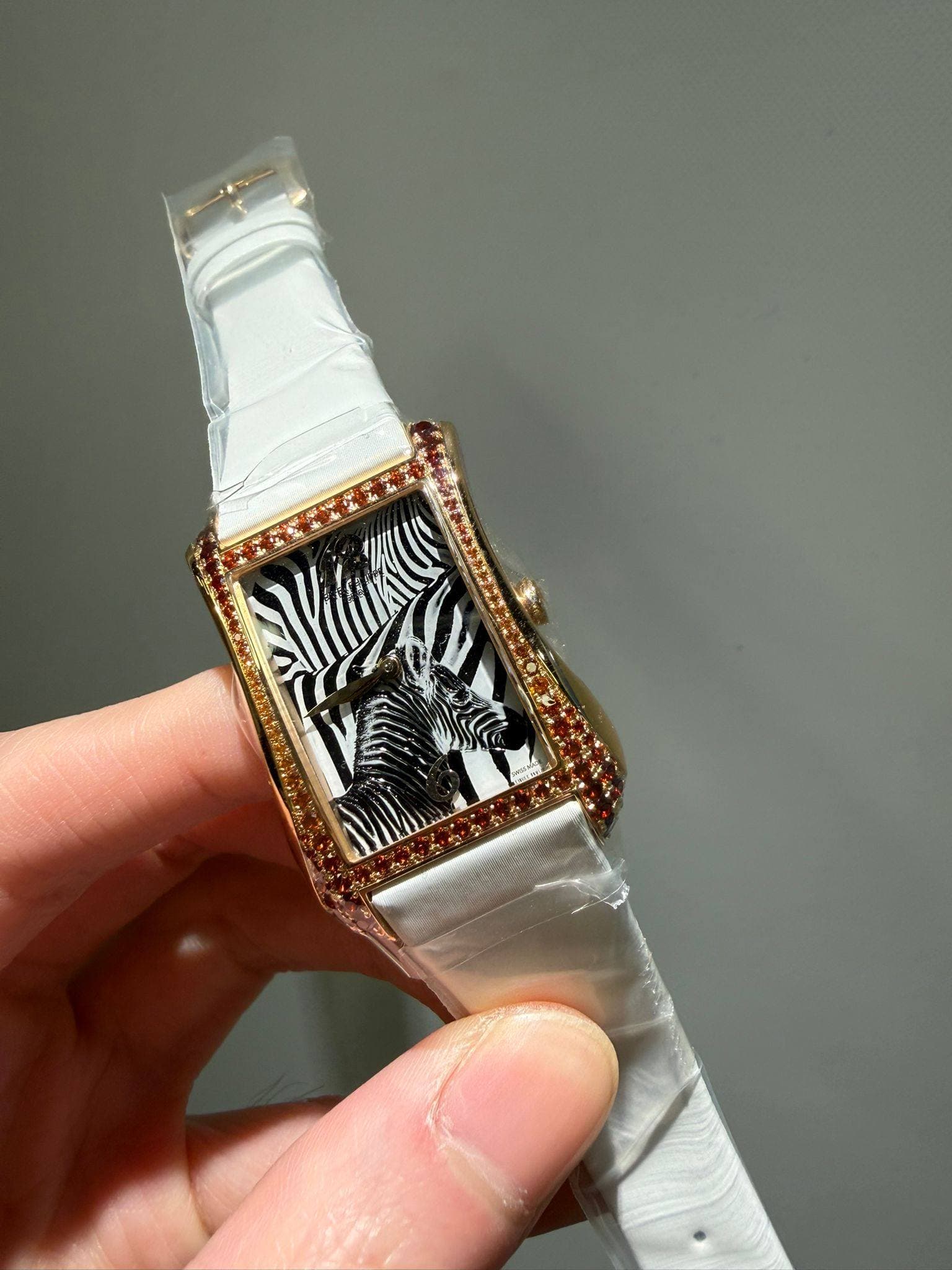 May be an image of digital watch and text