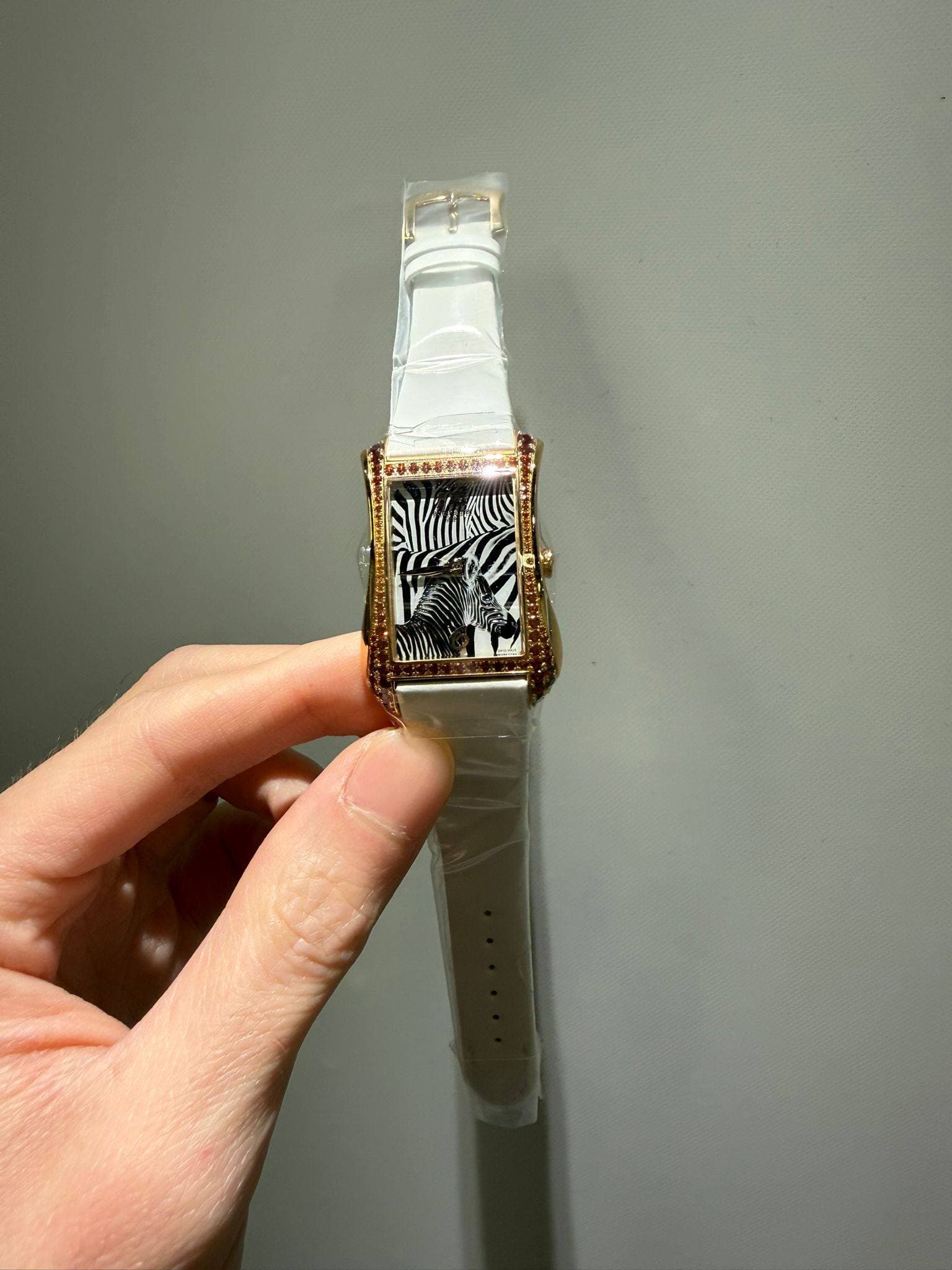 May be an image of digital watch and text