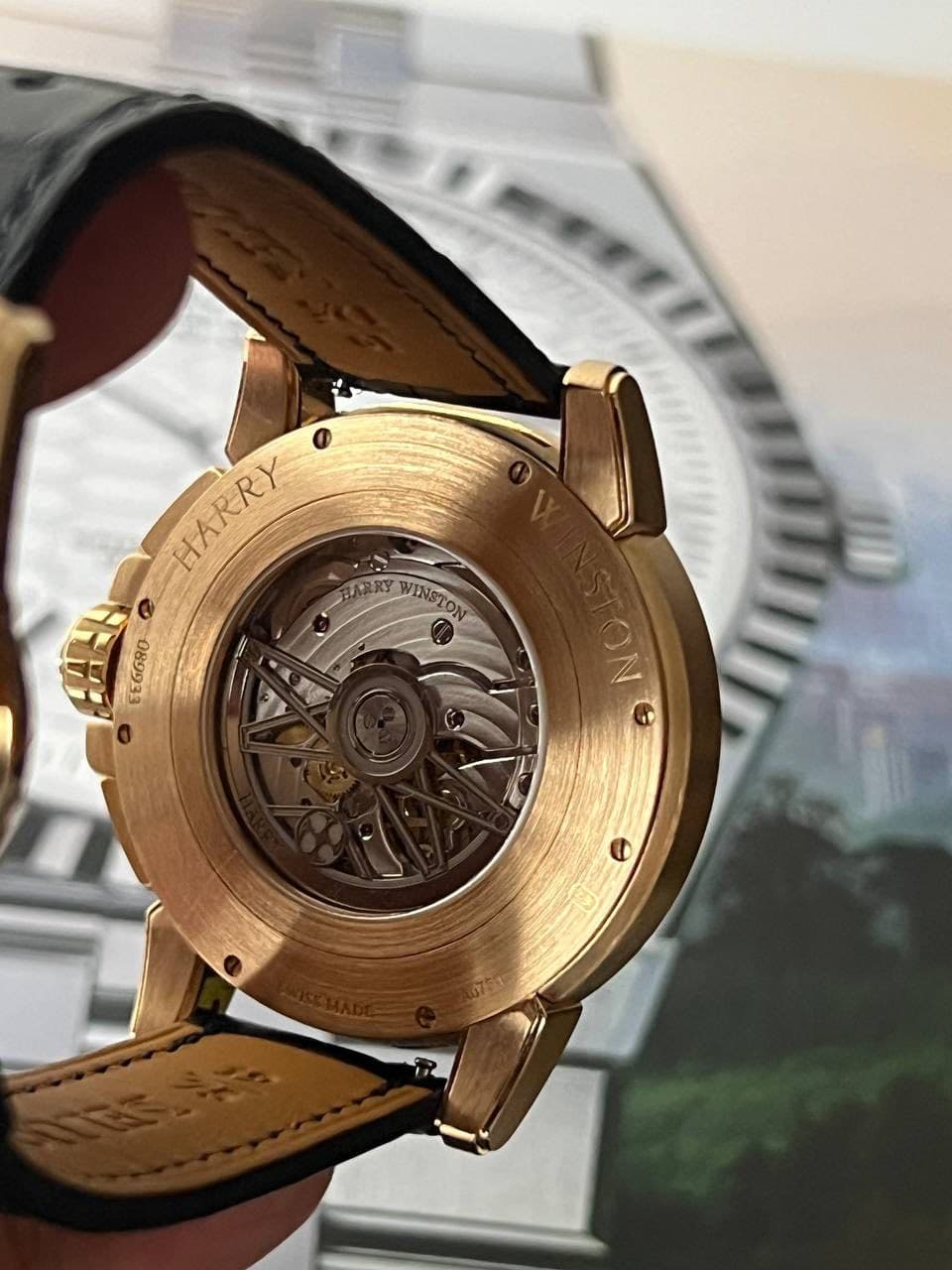 May be an image of wrist watch and text that says 'HARRY HAWINSION BARRY WINSTON HARRY ANH EEGGRO DE ONO ON'