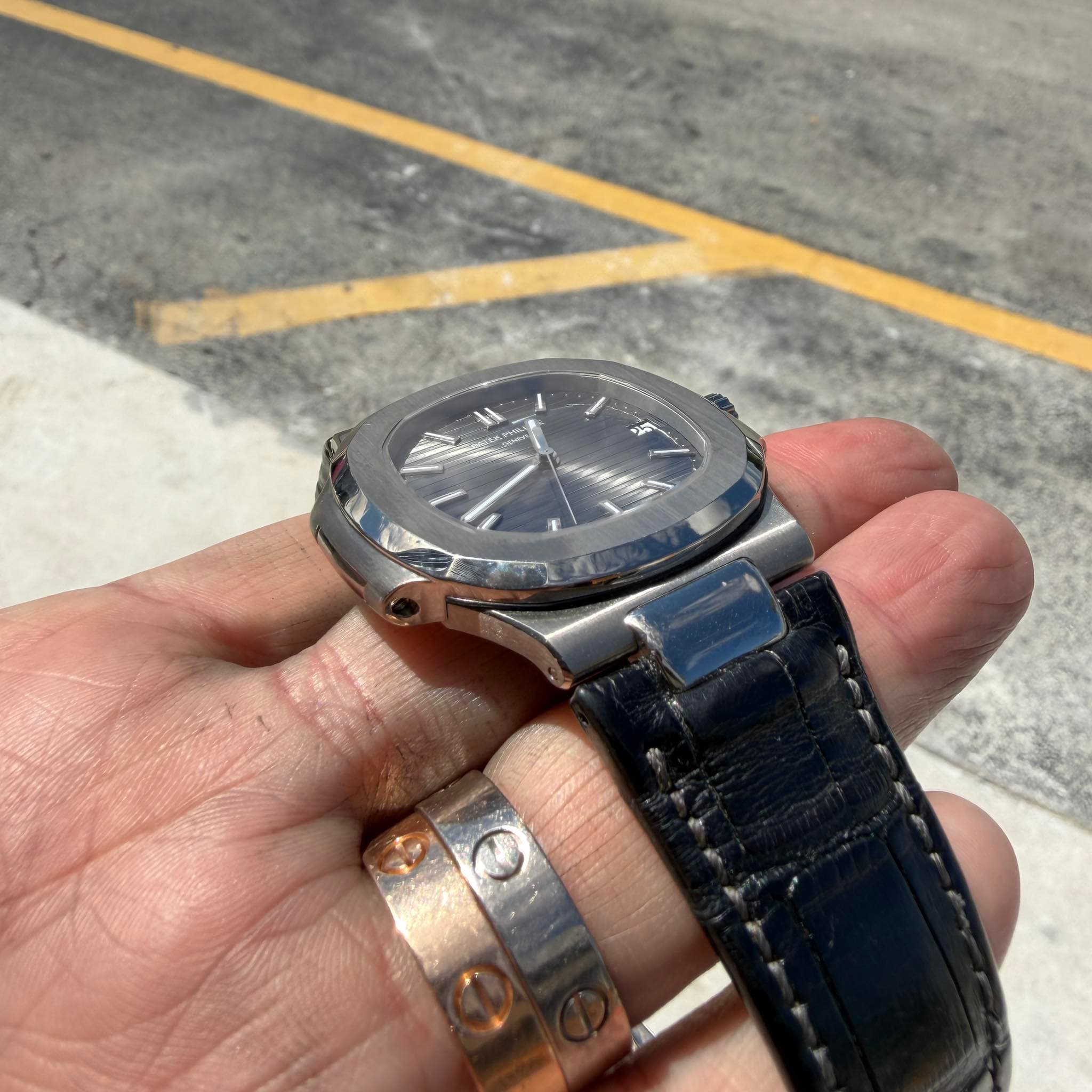 May be an image of wrist watch
