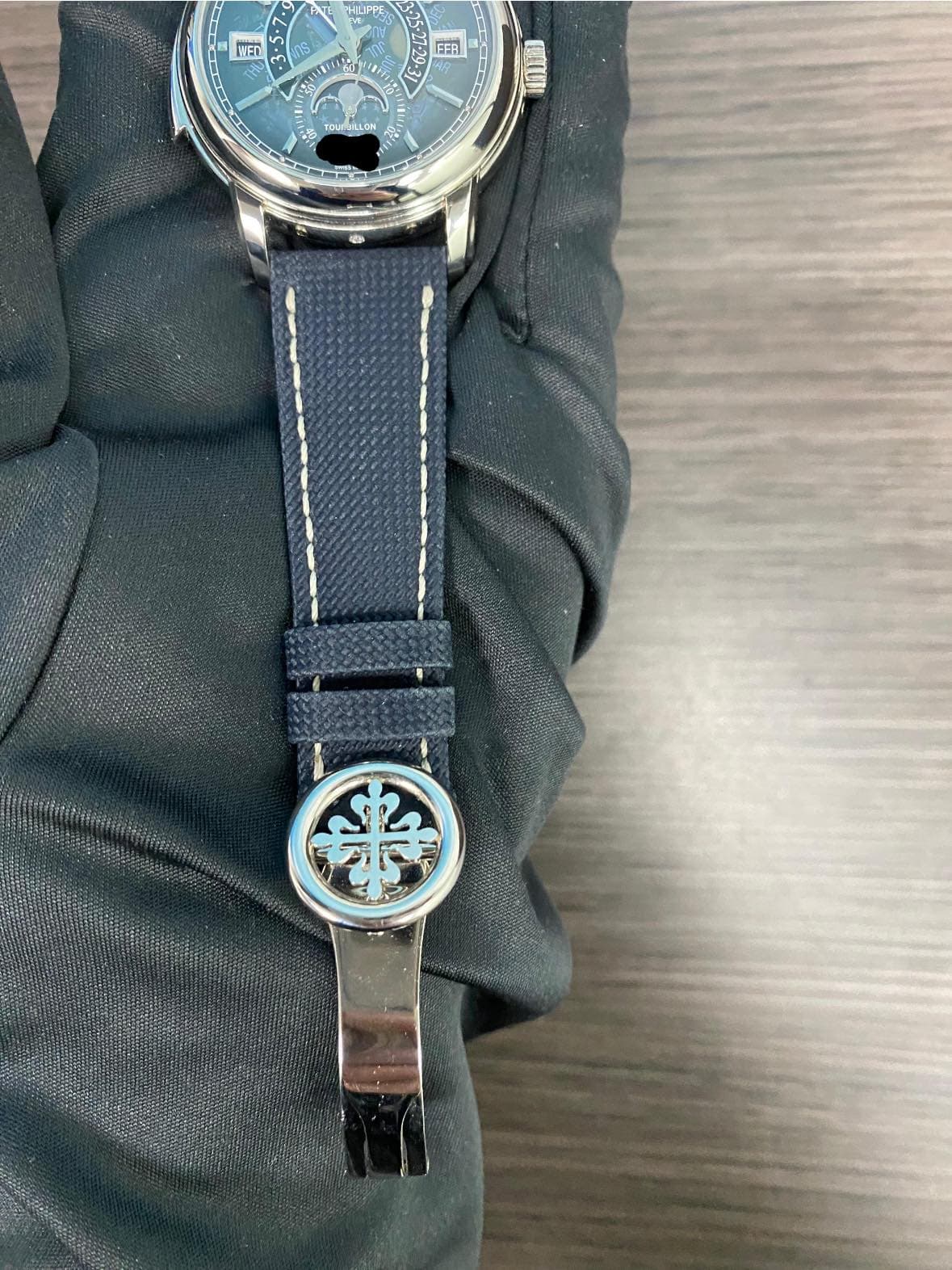May be an image of wrist watch and text