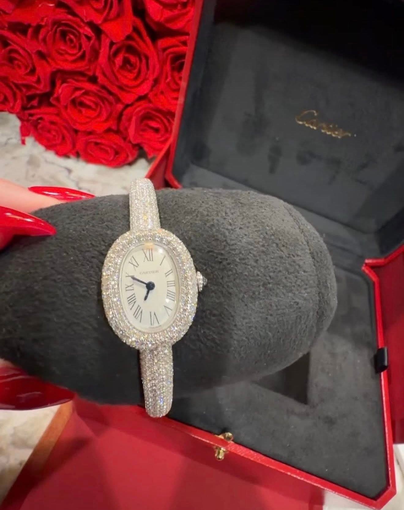 May be an image of wrist watch and text