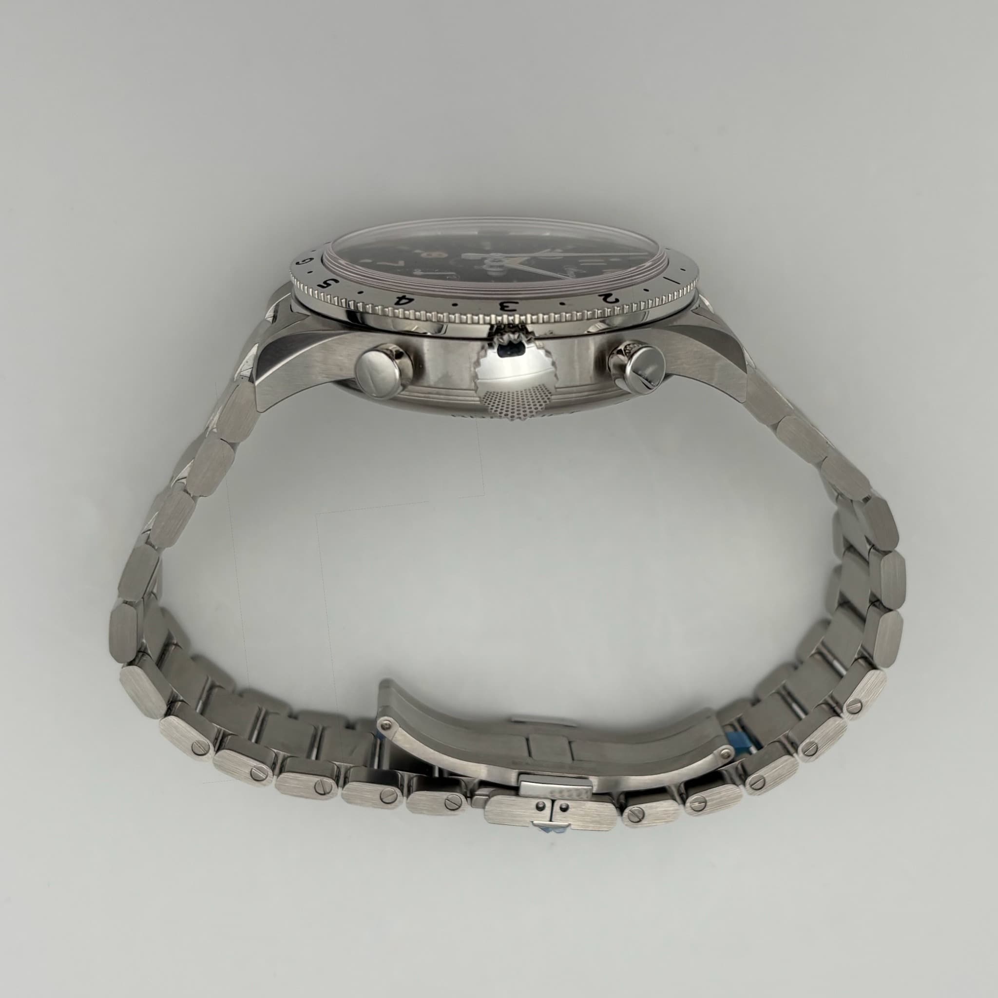 May be an image of jewelry and wrist watch