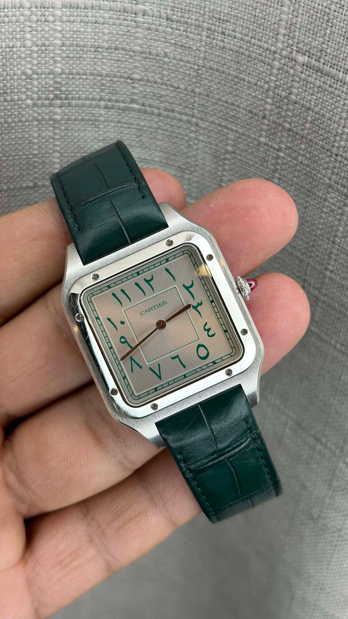 May be an image of digital watch and text